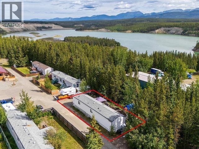411-989 Range Road, Whitehorse, YT - Outdoor With Body Of Water With View