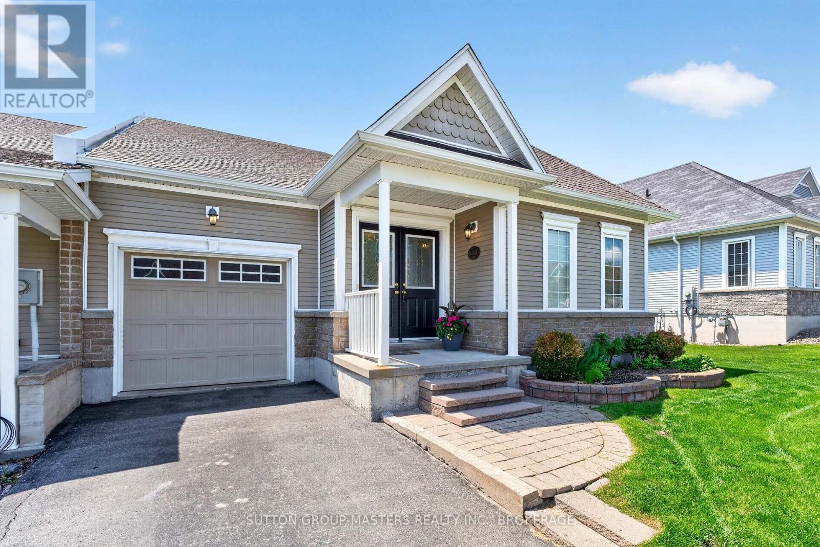133 Britannia Crescent, Loyalist (Bath), ON - Outdoor With Facade