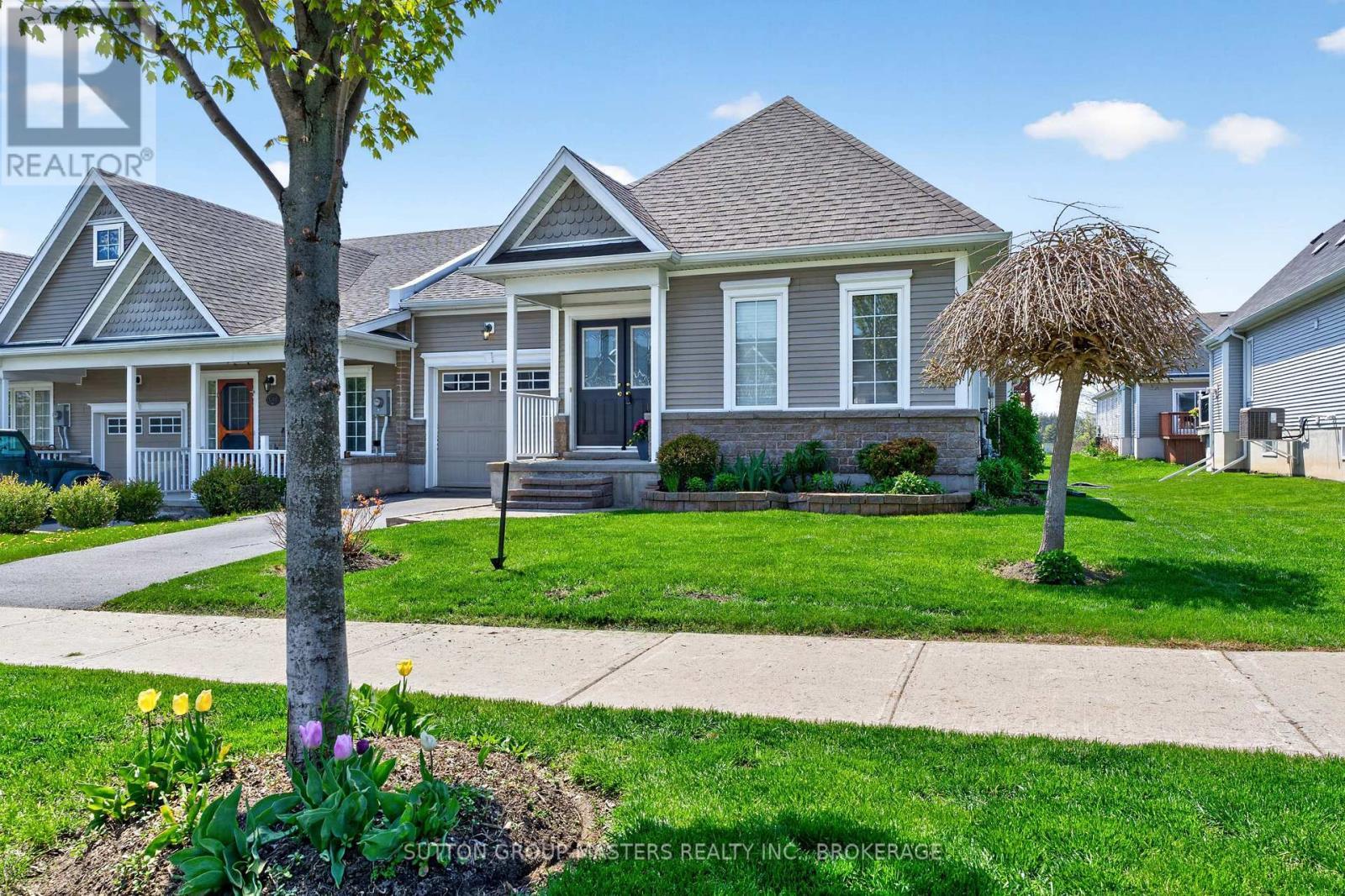 133 Britannia Crescent, Loyalist (Bath), ON - Outdoor With Facade