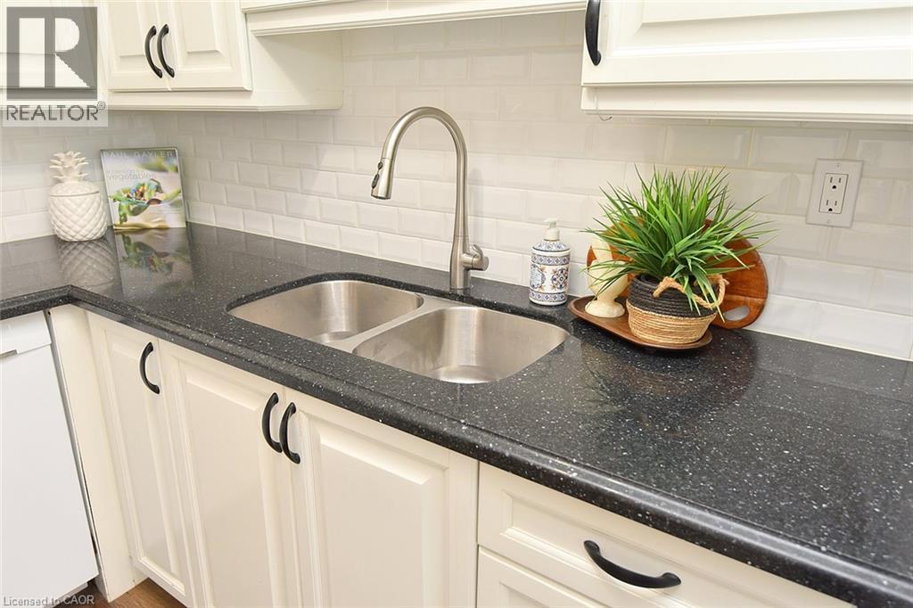 2263 Marine Drive Unit# 401, Oakville, ON - Indoor Photo Showing Kitchen With Double Sink