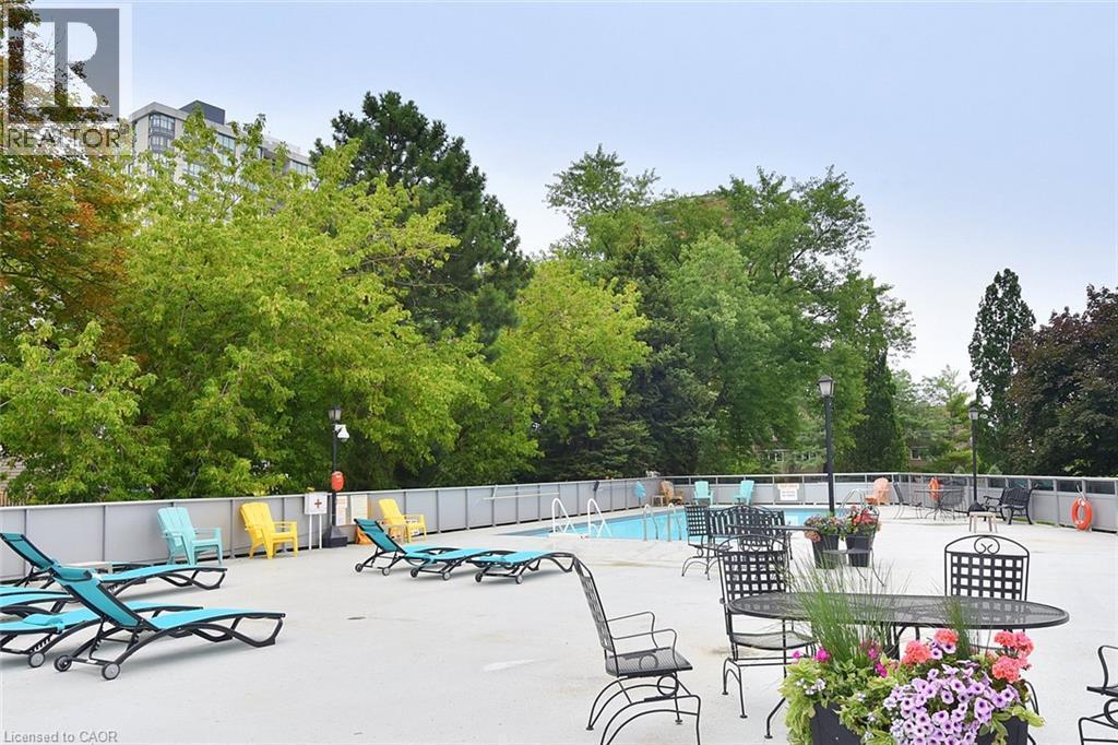 2263 Marine Drive Unit# 401, Oakville, ON - Outdoor With In Ground Pool