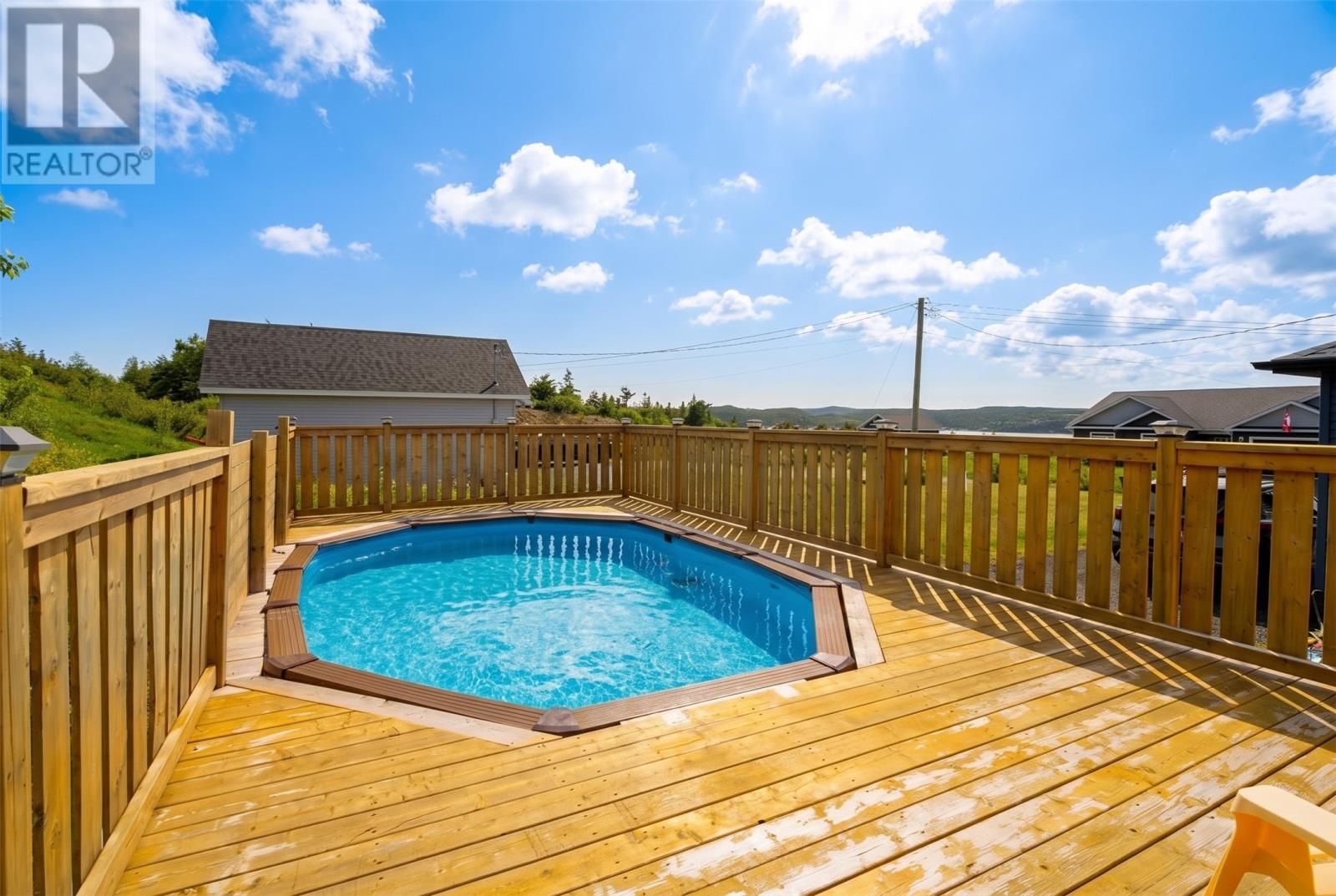 7 Sunset Drive, Holyrood, NL - Outdoor With Above Ground Pool