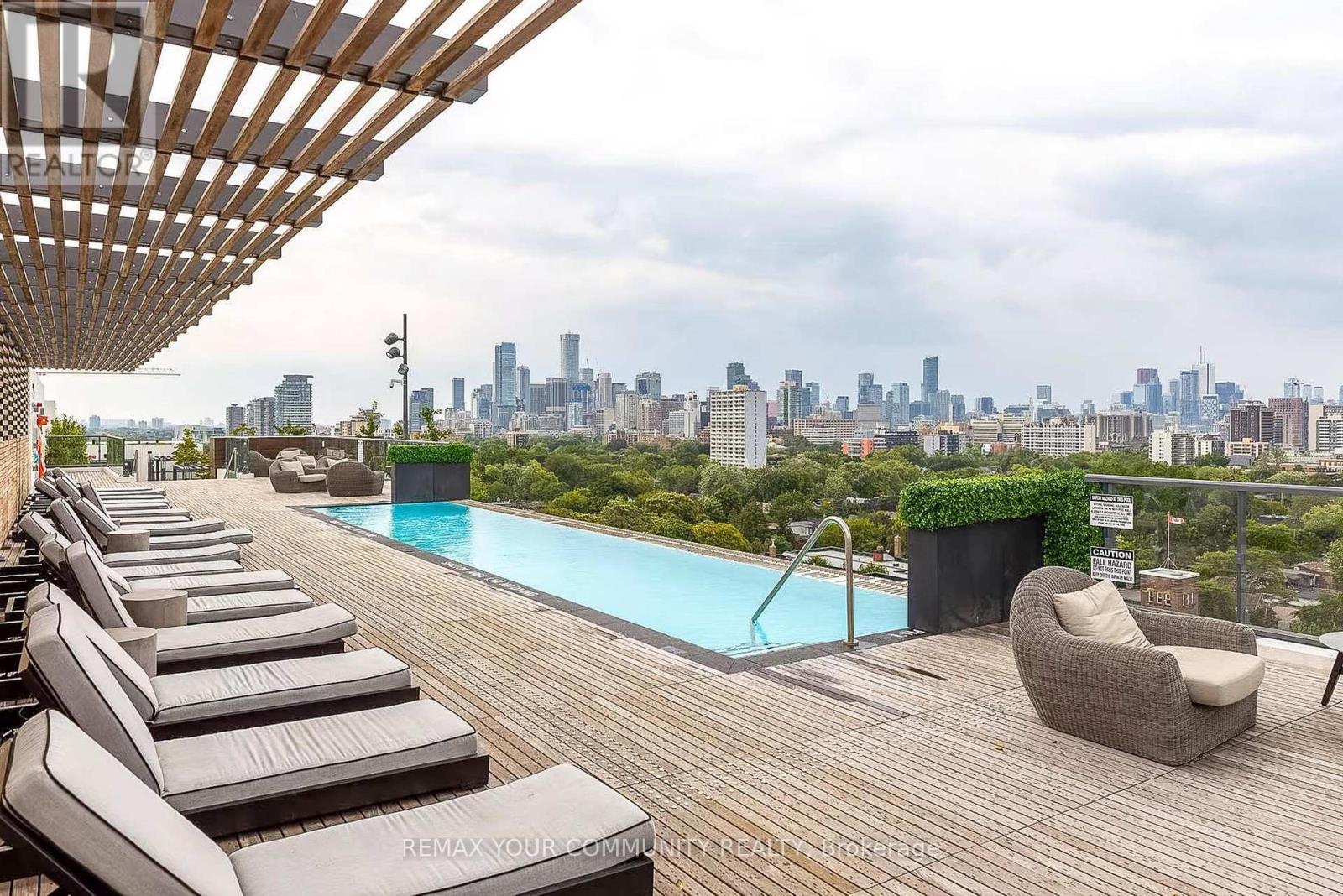 208 - 280 Howland Avenue, Toronto, ON - Outdoor With In Ground Pool