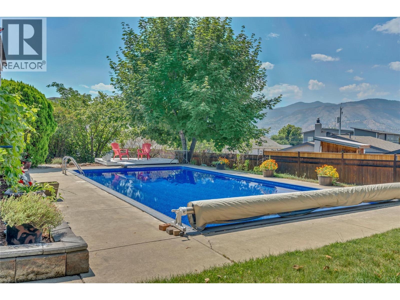 707 Ross Avenue, Penticton, BC - Outdoor With In Ground Pool