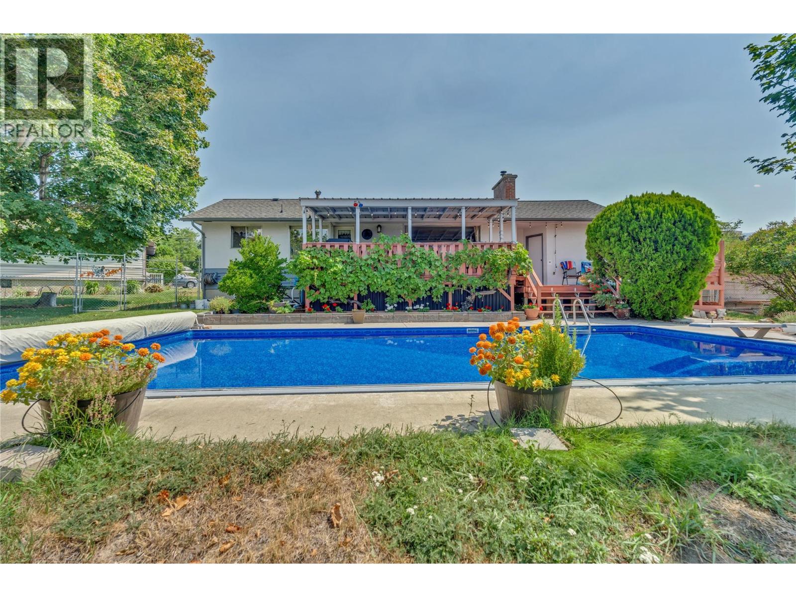 707 Ross Avenue, Penticton, BC - Outdoor With In Ground Pool