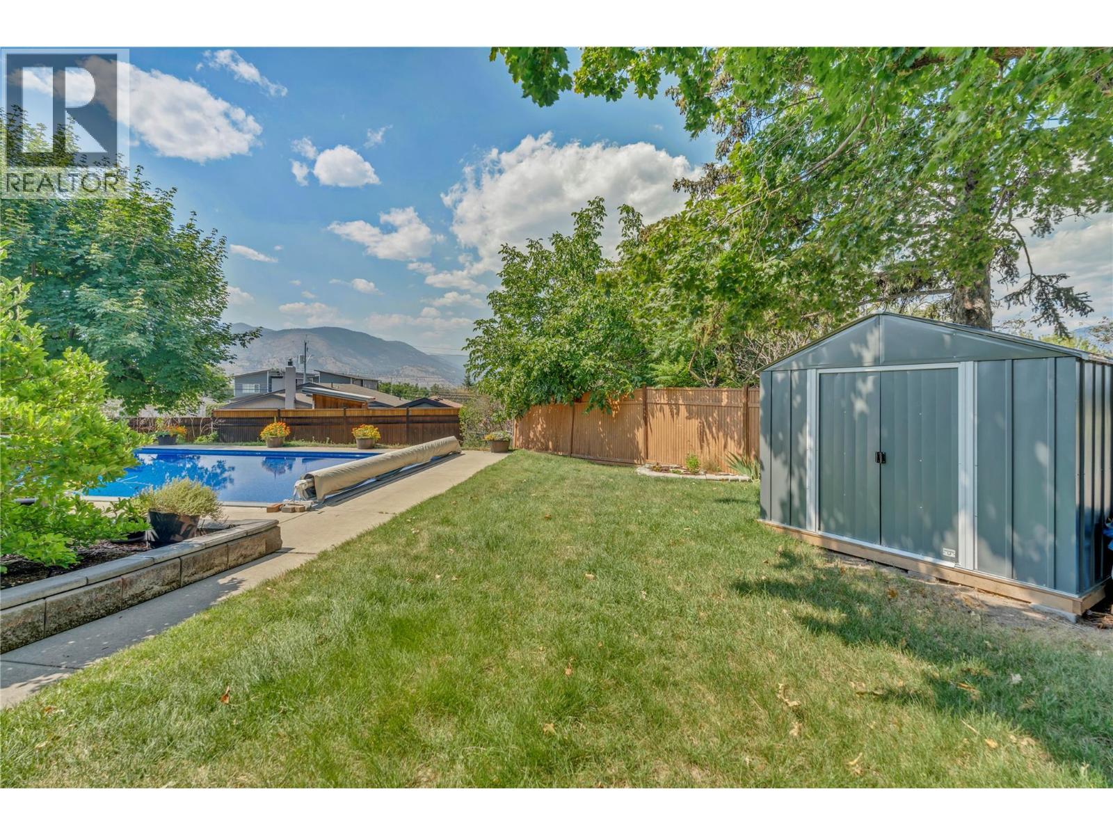 707 Ross Avenue, Penticton, BC - Outdoor With In Ground Pool