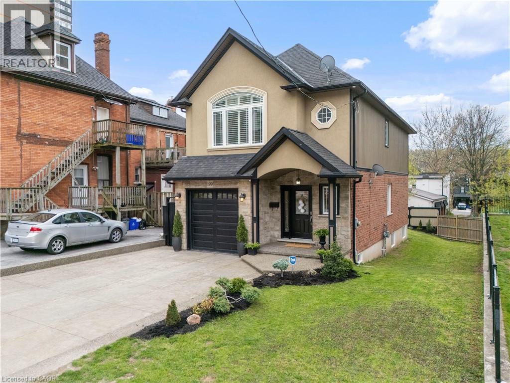 Contemporary exterior with stucco and brick facade - 199 Hunter Street W, Hamilton, ON - Outdoor