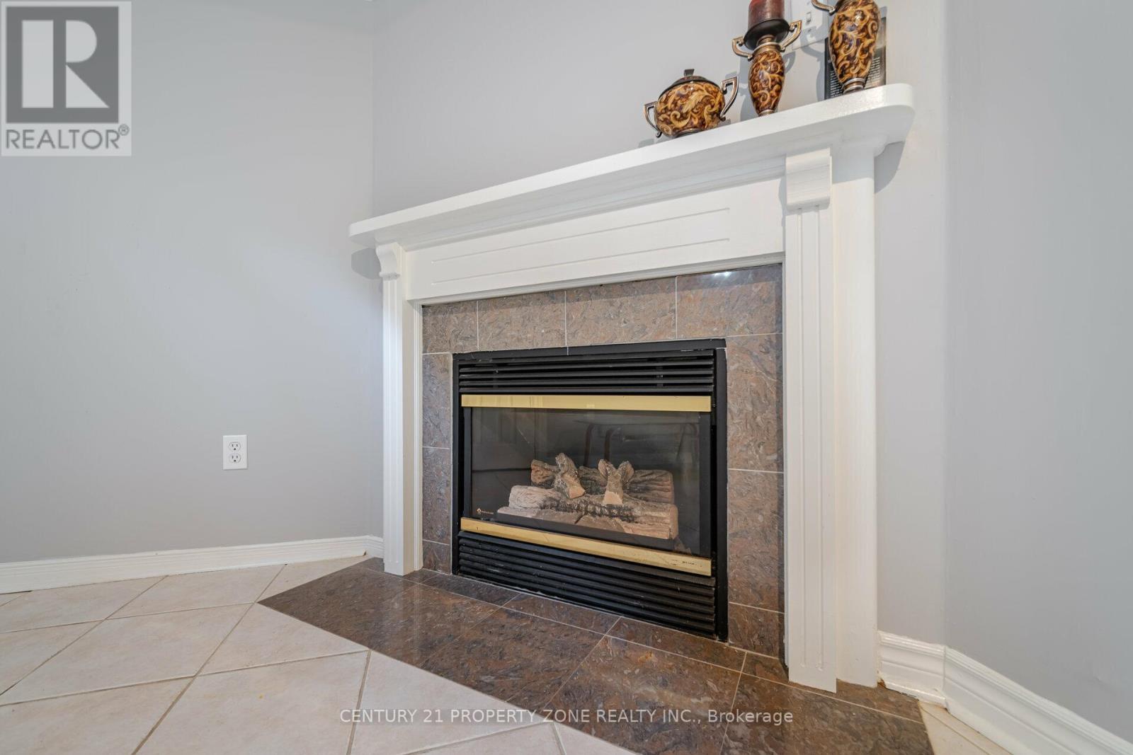 Fireplace in Basement - 86 Rory Road, Toronto, ON - Indoor Photo Showing Other Room With Fireplace