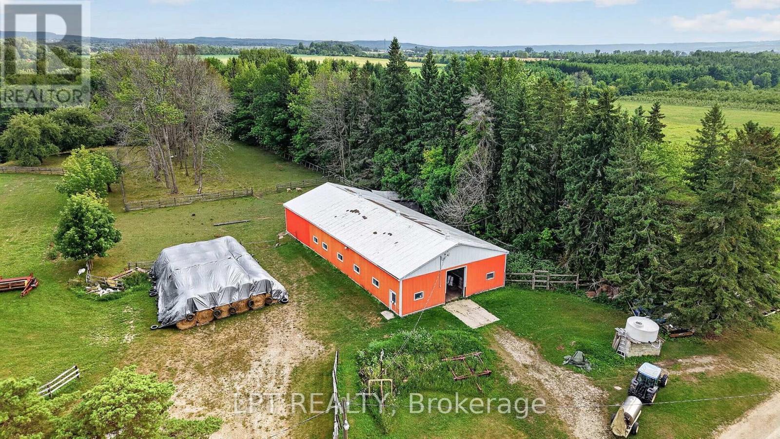 Steal building with built in stalls. - 416476 10Th Line S, Blue Mountains, ON