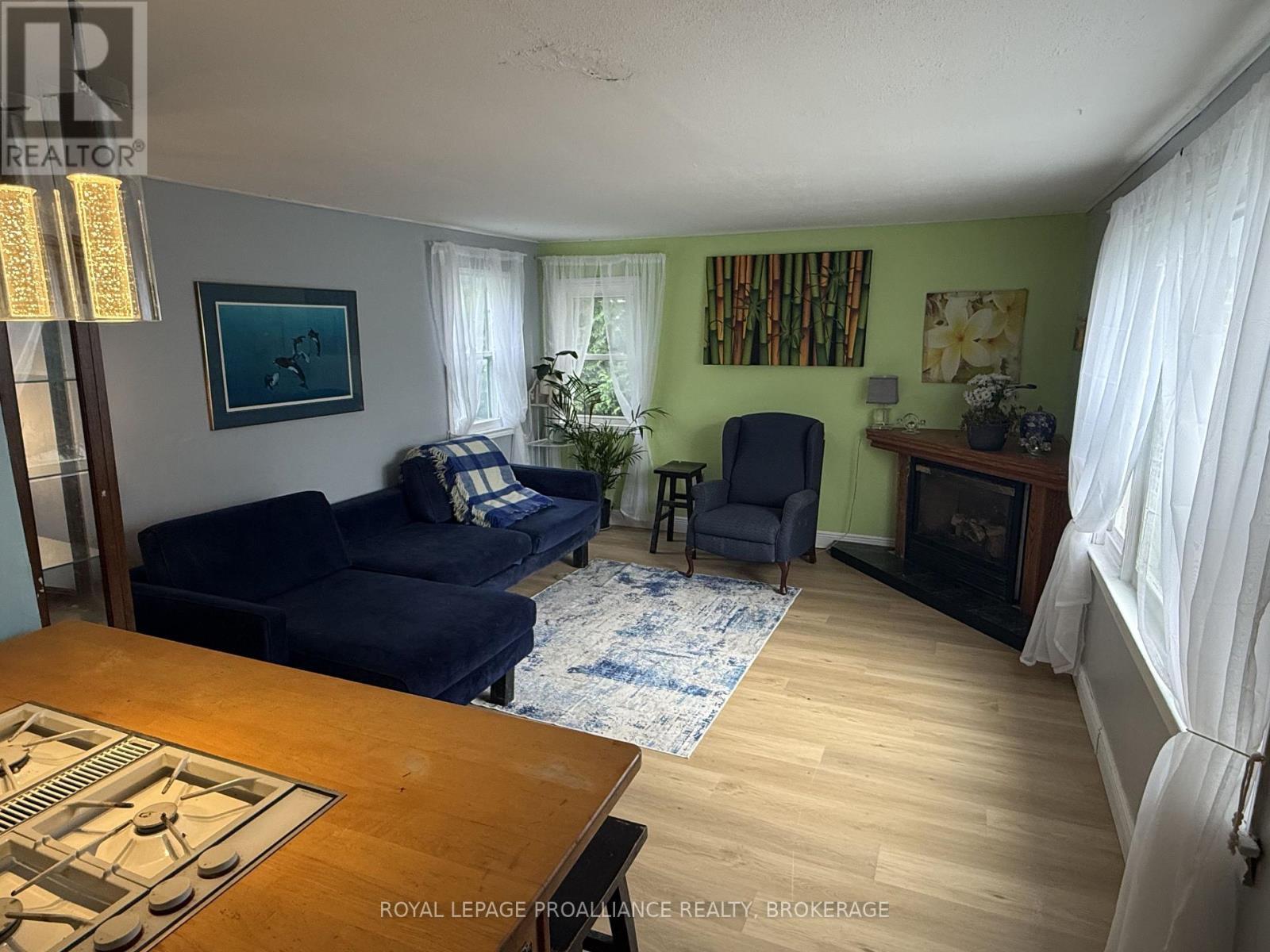 10 Potter Drive, Loyalist (Odessa), ON - Indoor Photo Showing Living Room With Fireplace