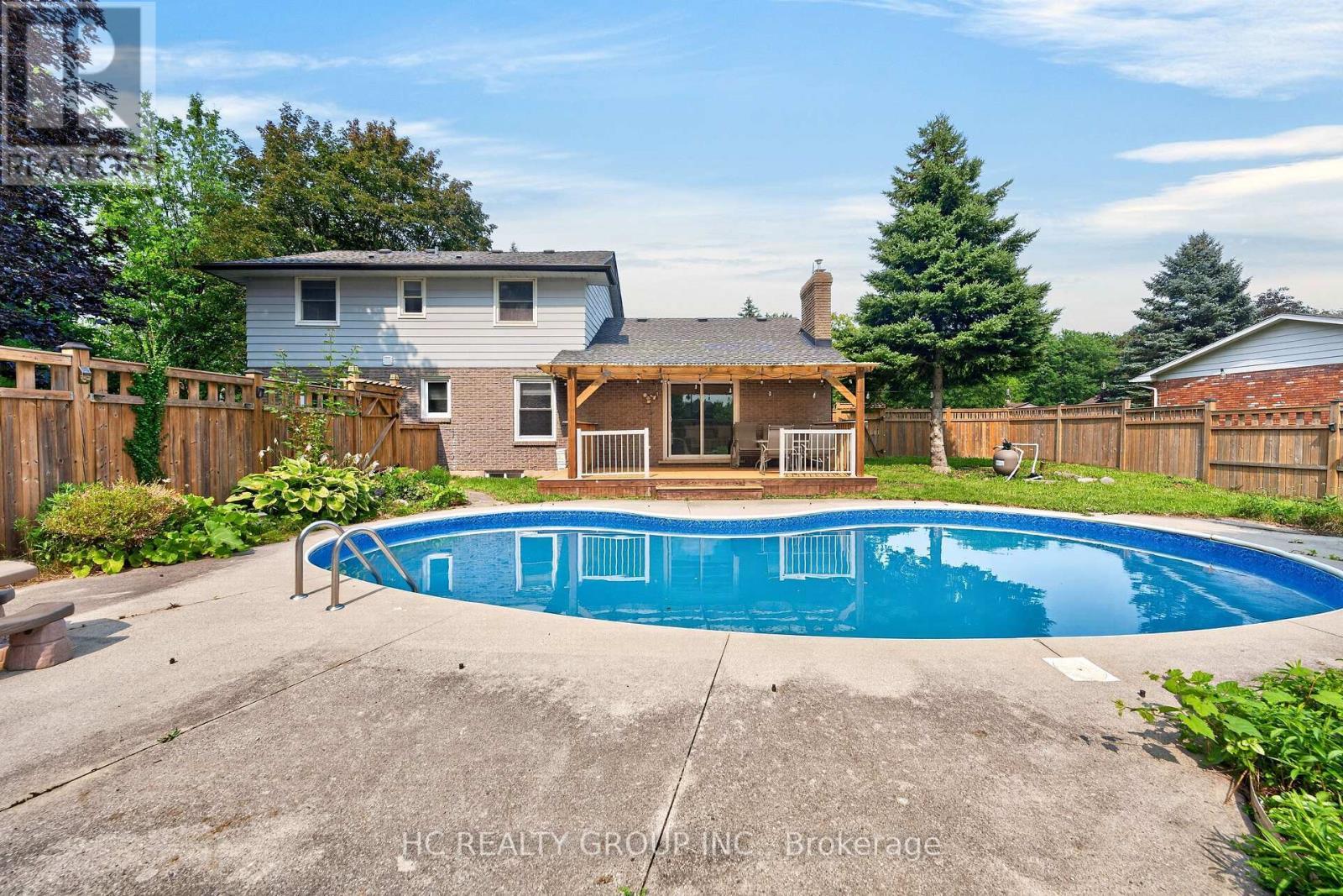22 Fireside Drive, Hamilton, ON - Outdoor With In Ground Pool With Backyard