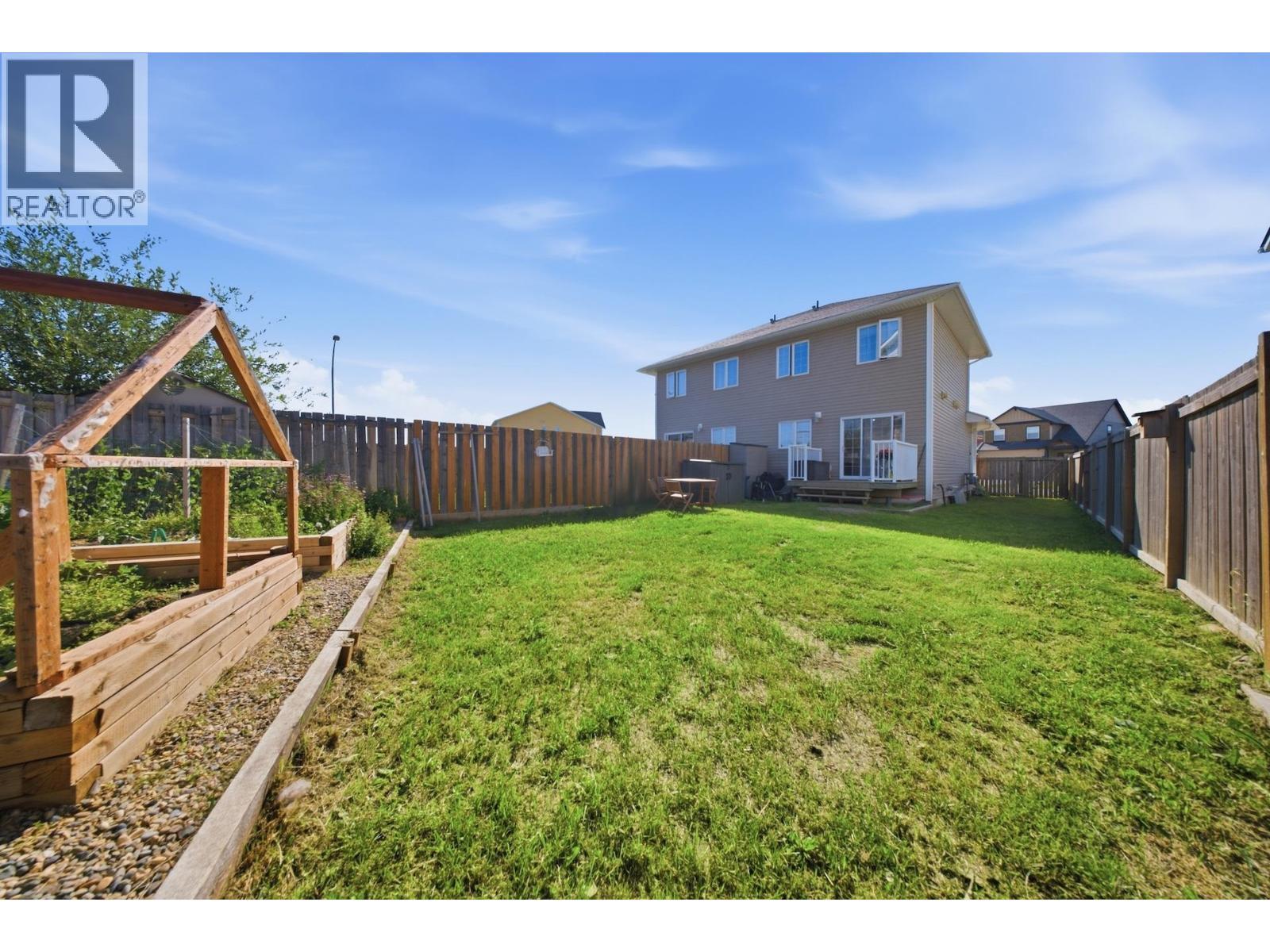 8406 86 Avenue, Fort St. John, BC - Outdoor With Backyard