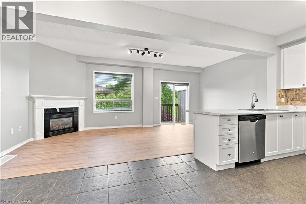 5065 Serena Drive, Beamsville, ON - Indoor Photo Showing Living Room With Fireplace