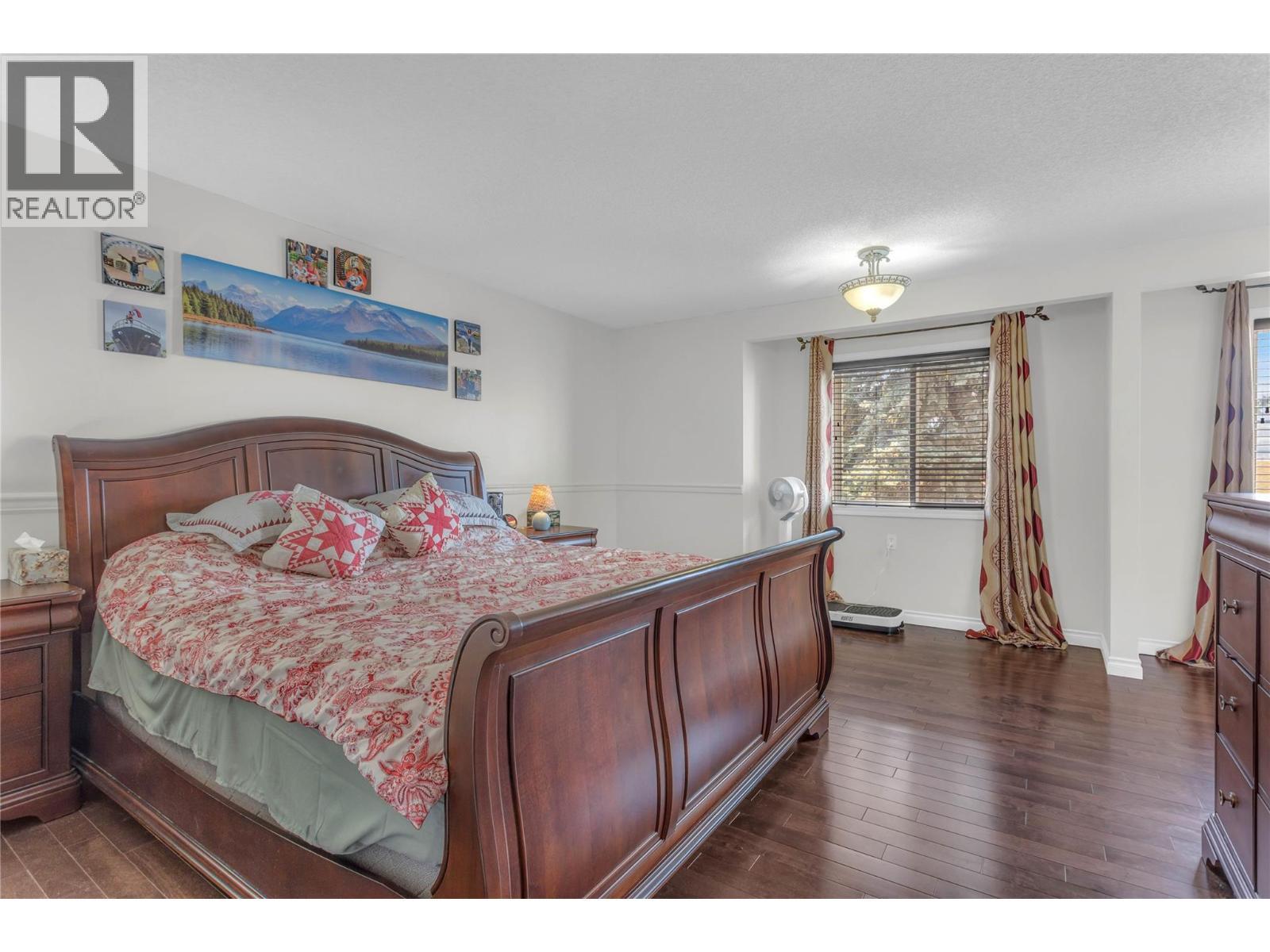 1675 Thayer Court Unit# 1, Kelowna, BC - Indoor Photo Showing Bedroom
