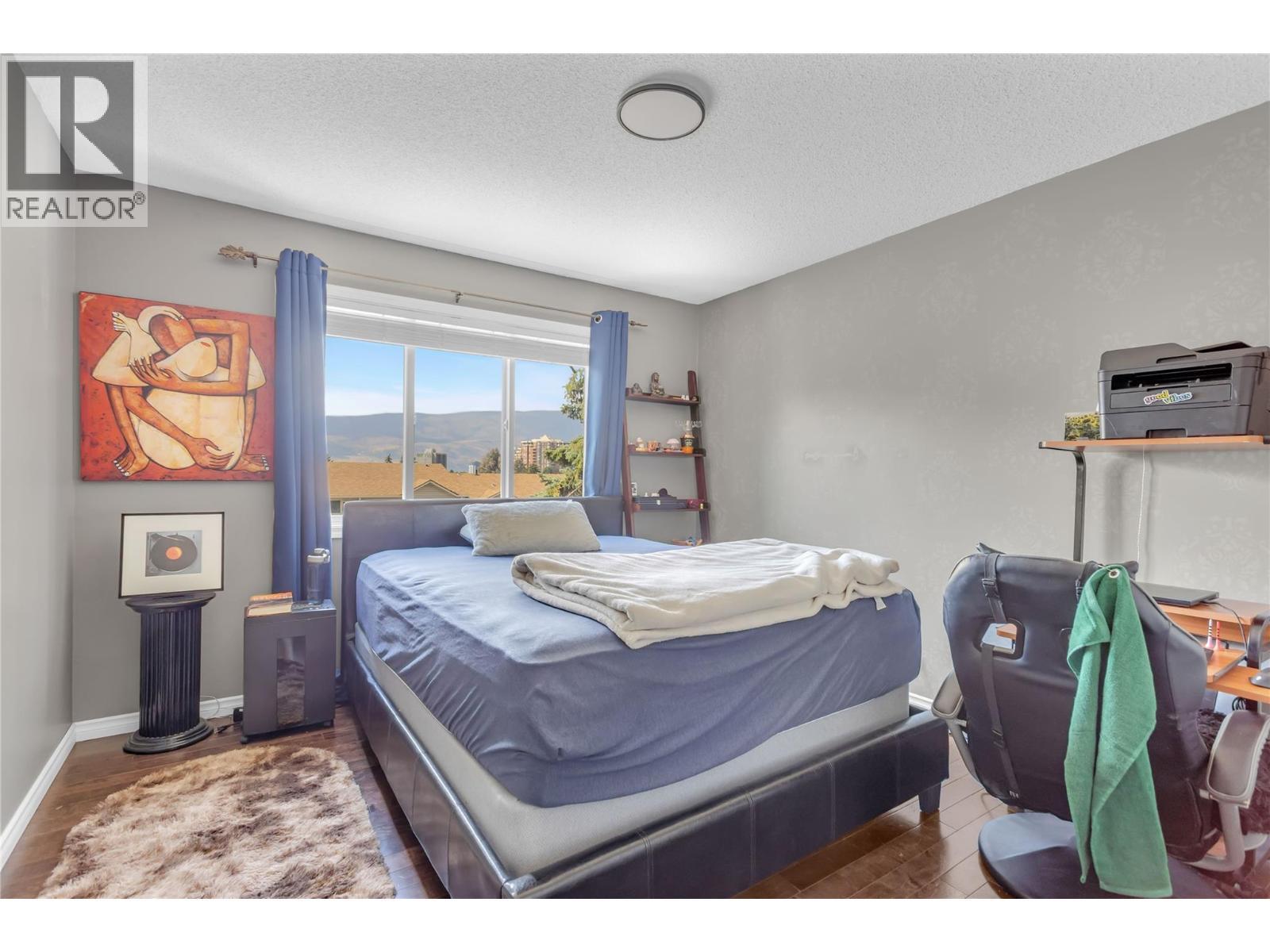 1675 Thayer Court Unit# 1, Kelowna, BC - Indoor Photo Showing Bedroom