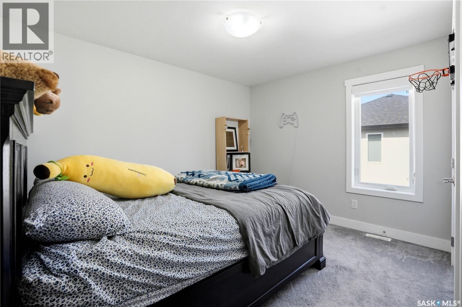 206 Kenaschuk Union, Saskatoon, SK - Indoor Photo Showing Bedroom