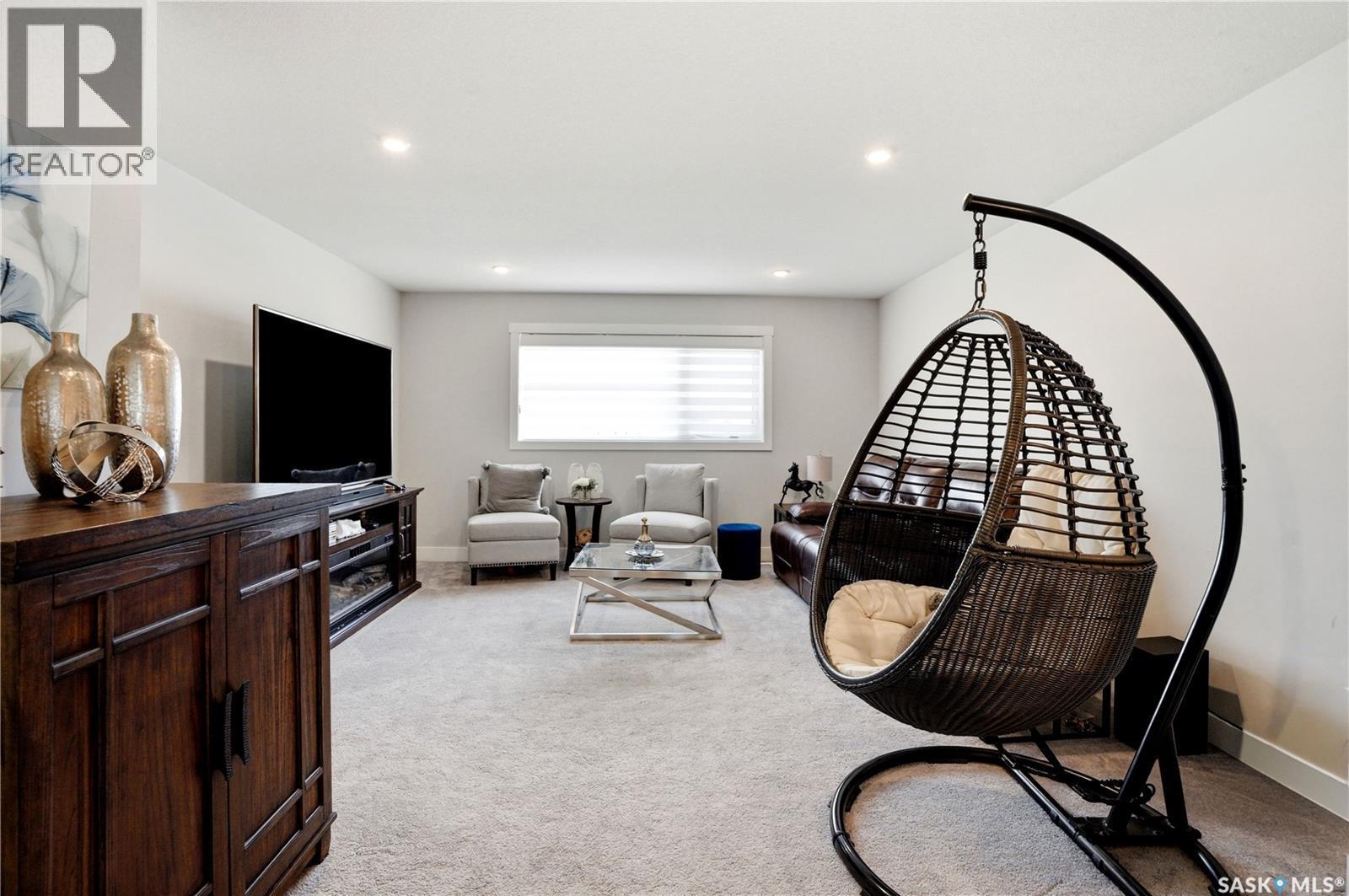 206 Kenaschuk Union, Saskatoon, SK - Indoor Photo Showing Living Room