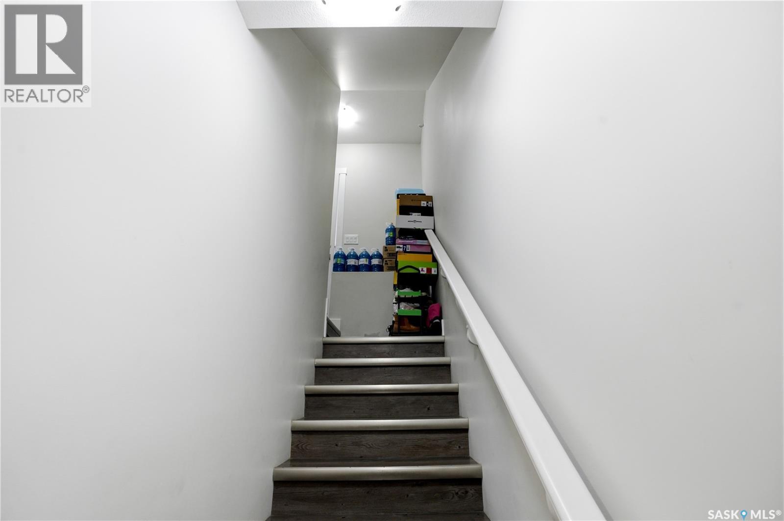 206 Kenaschuk Union, Saskatoon, SK - Indoor Photo Showing Other Room