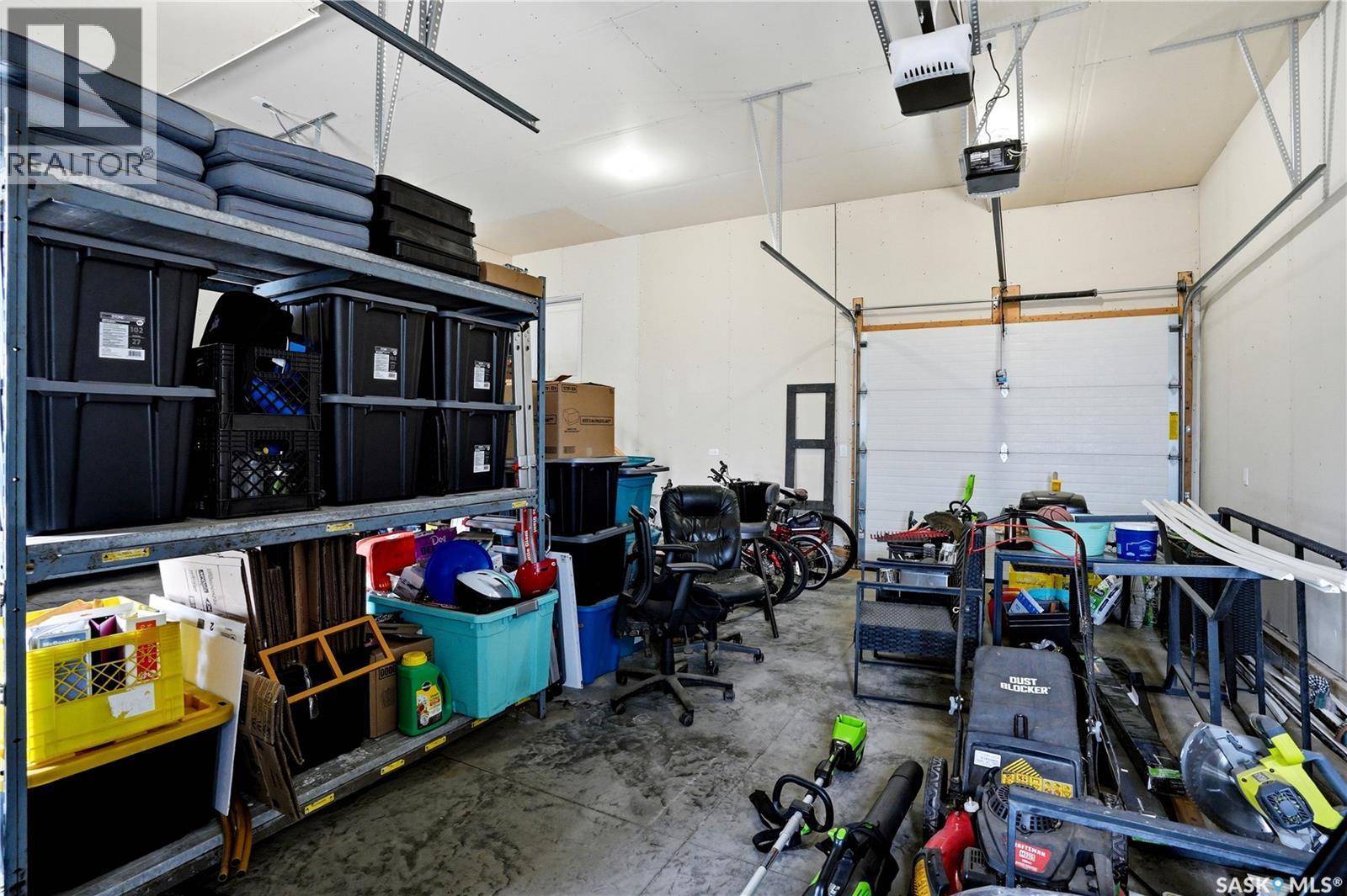 206 Kenaschuk Union, Saskatoon, SK - Indoor Photo Showing Garage