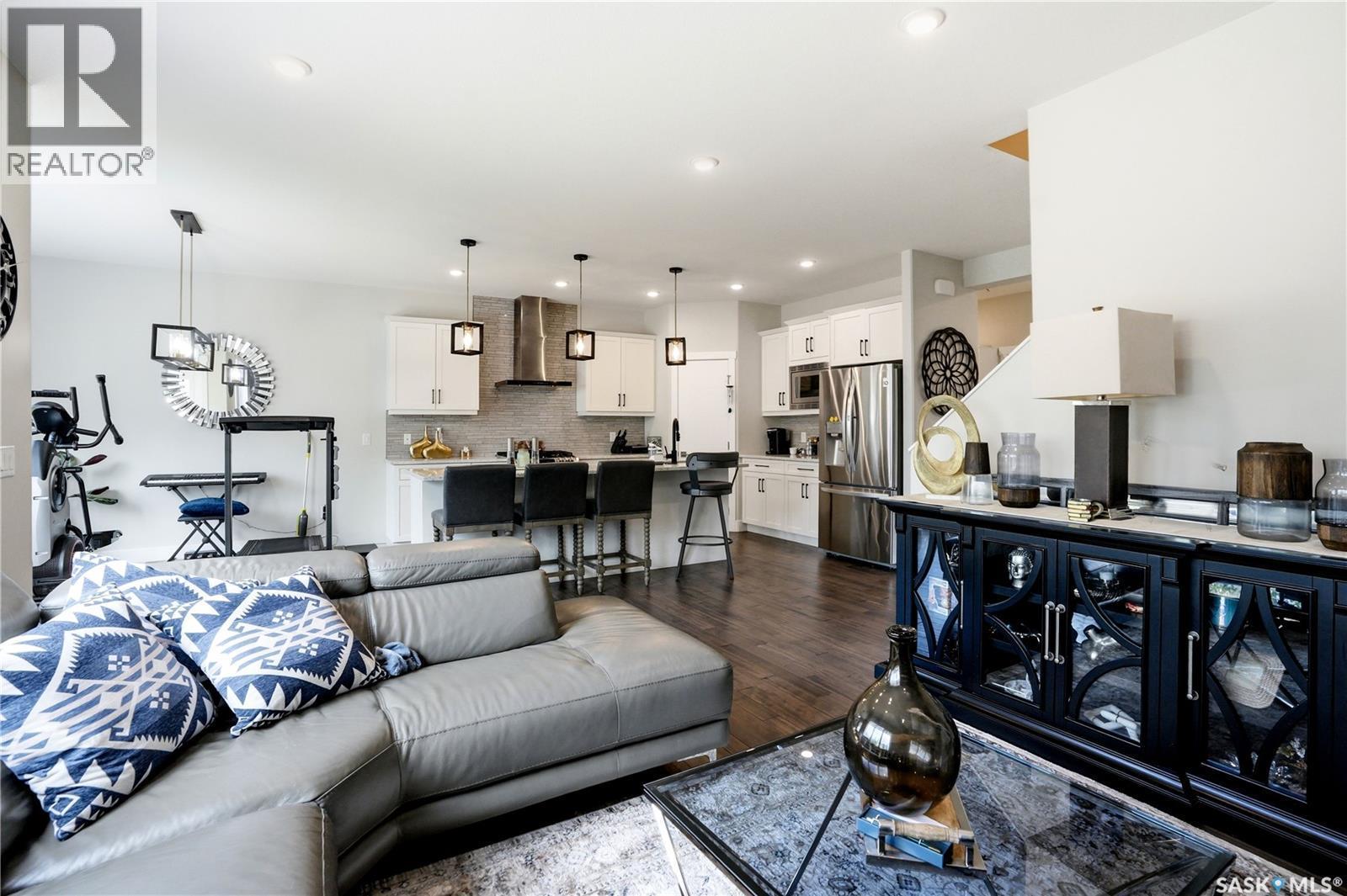 206 Kenaschuk Union, Saskatoon, SK - Indoor Photo Showing Living Room