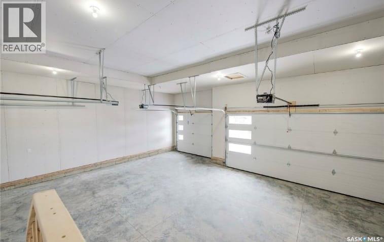 206 Kenaschuk Union, Saskatoon, SK - Indoor Photo Showing Garage