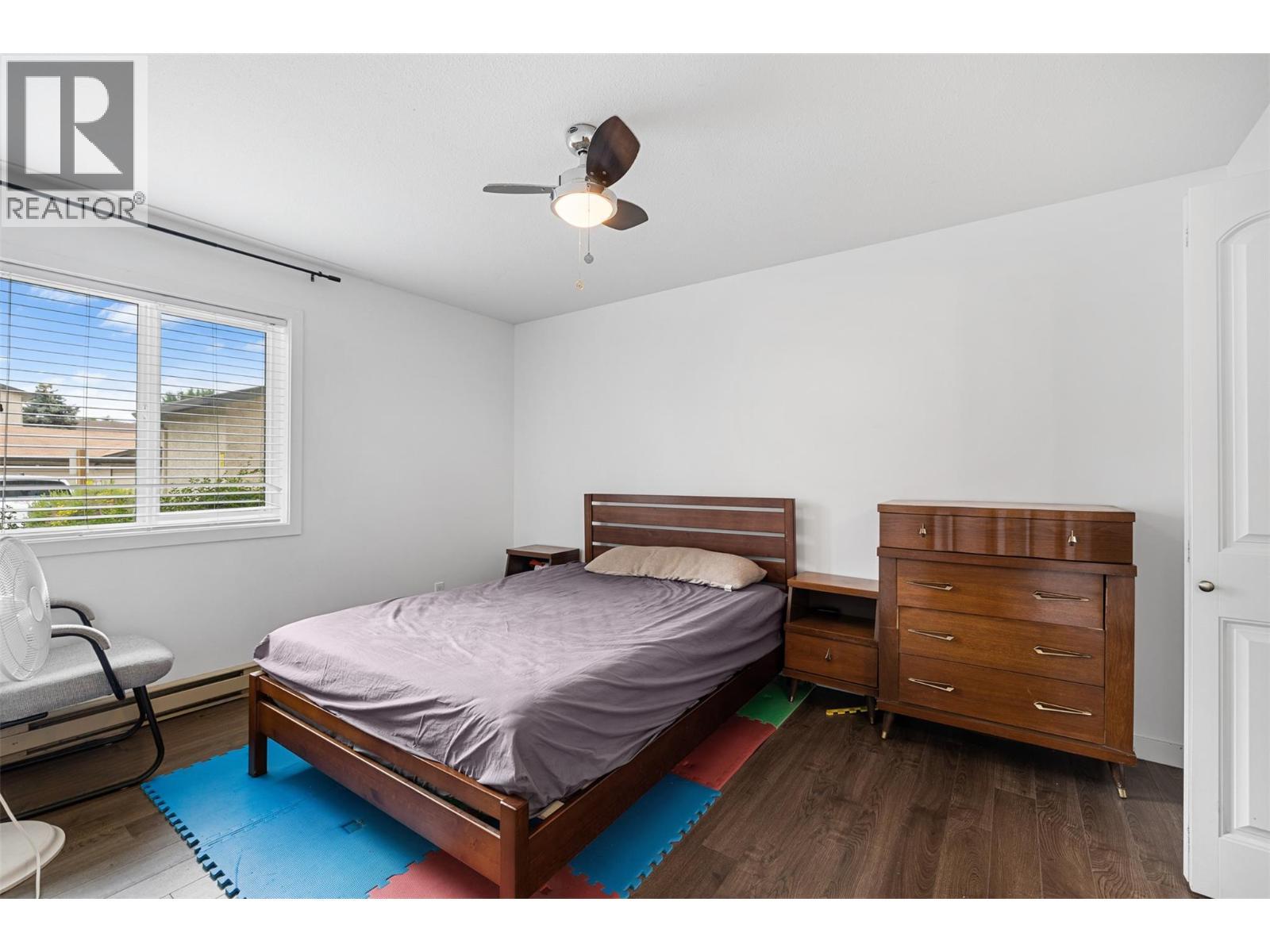 735 Cook Road Unit# 104C, Kelowna, BC - Indoor Photo Showing Bedroom