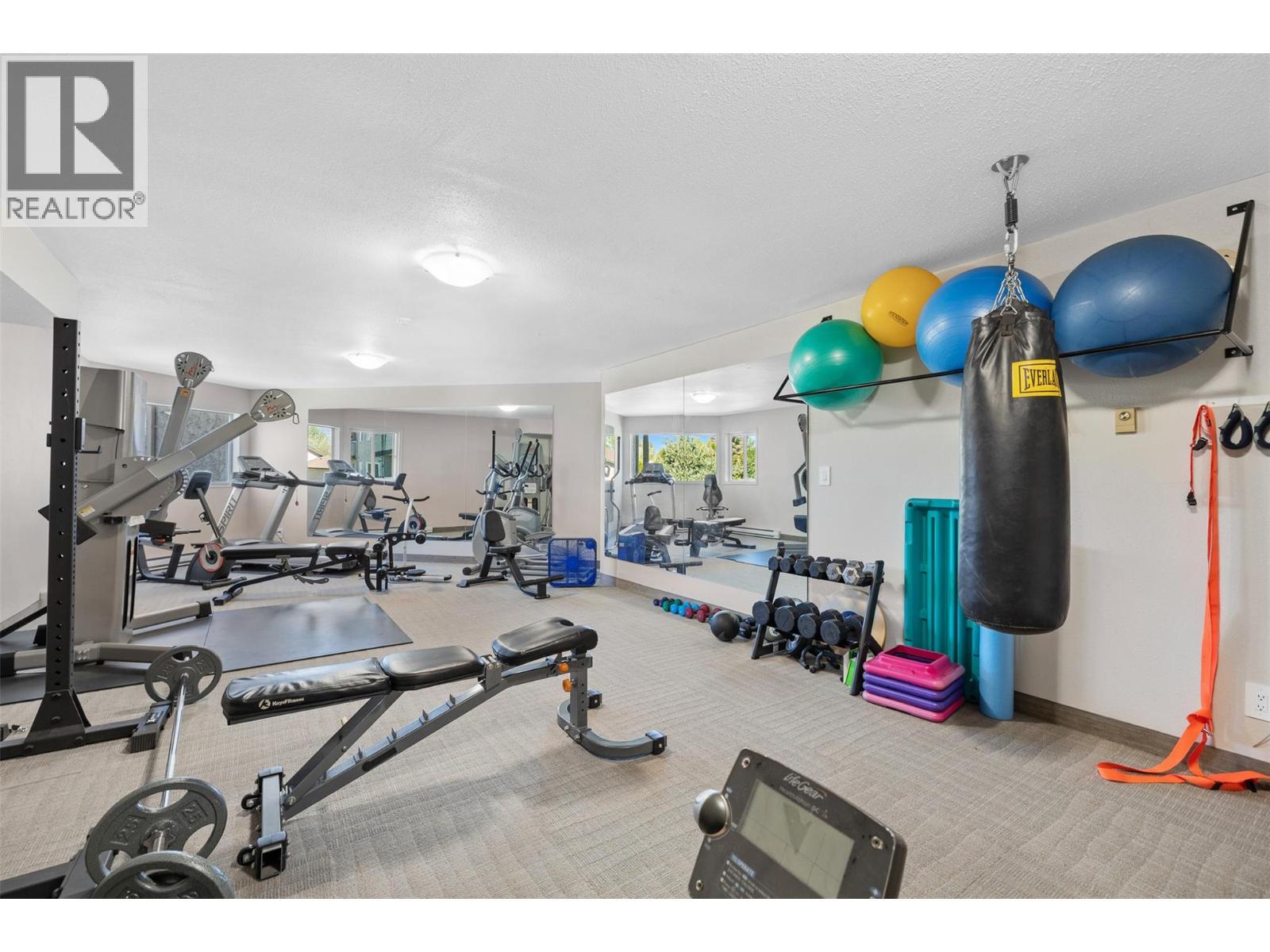 735 Cook Road Unit# 104C, Kelowna, BC - Indoor Photo Showing Gym Room