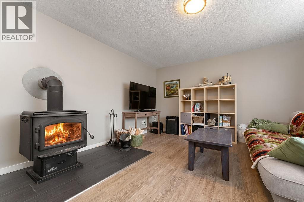 1110 6Th Street S, Invermere, BC - Indoor Photo Showing Other Room With Fireplace