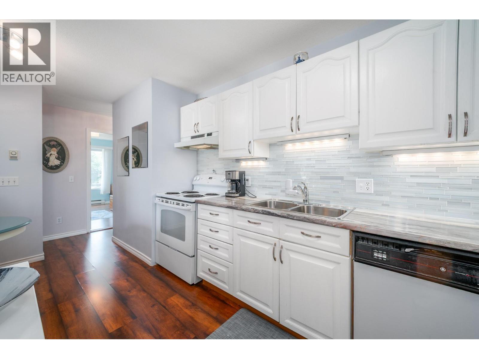 878 Bernard Avenue Unit# 103, Kelowna, BC - Indoor Photo Showing Kitchen With Double Sink