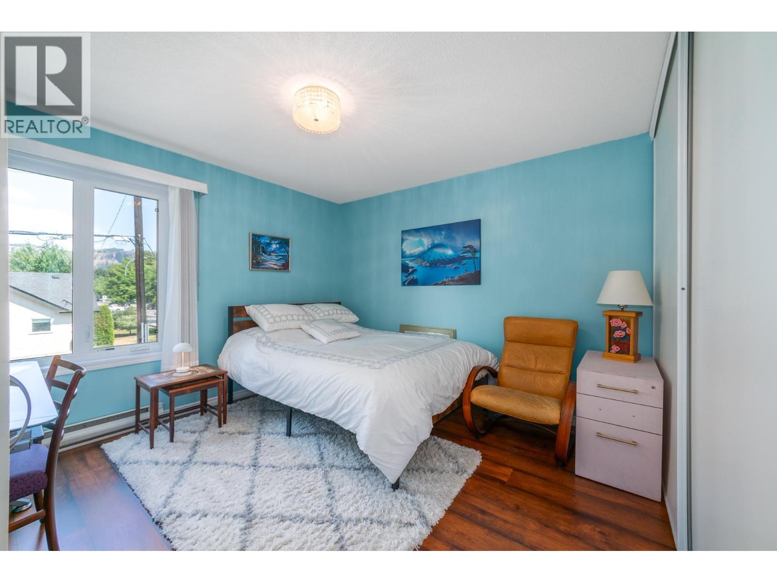 878 Bernard Avenue Unit# 103, Kelowna, BC - Indoor Photo Showing Bedroom