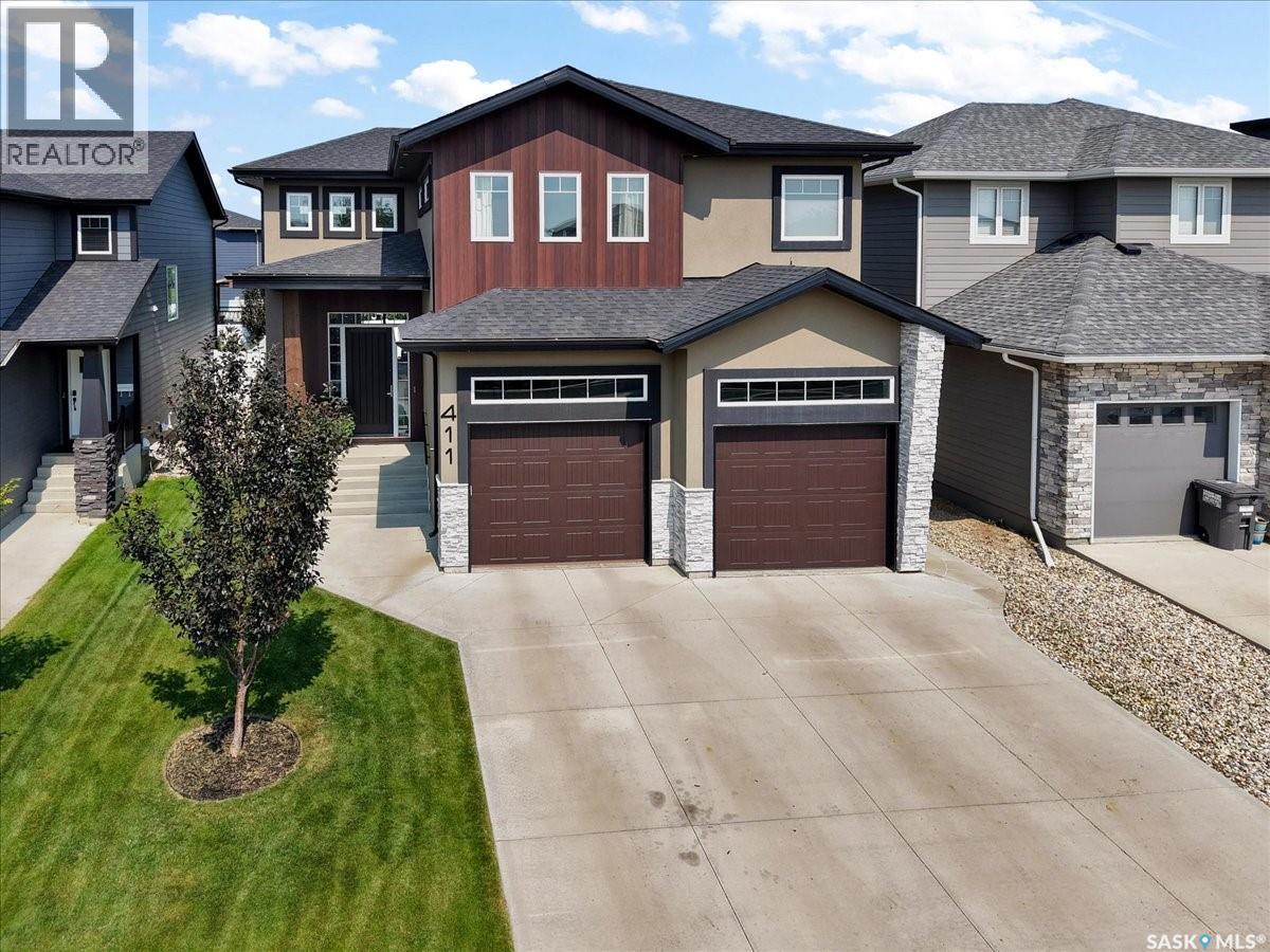 411 Dagnone Terrace, Saskatoon, SK - Outdoor With Facade