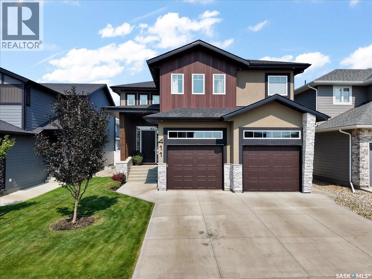 411 Dagnone Terrace, Saskatoon, SK - Outdoor With Facade