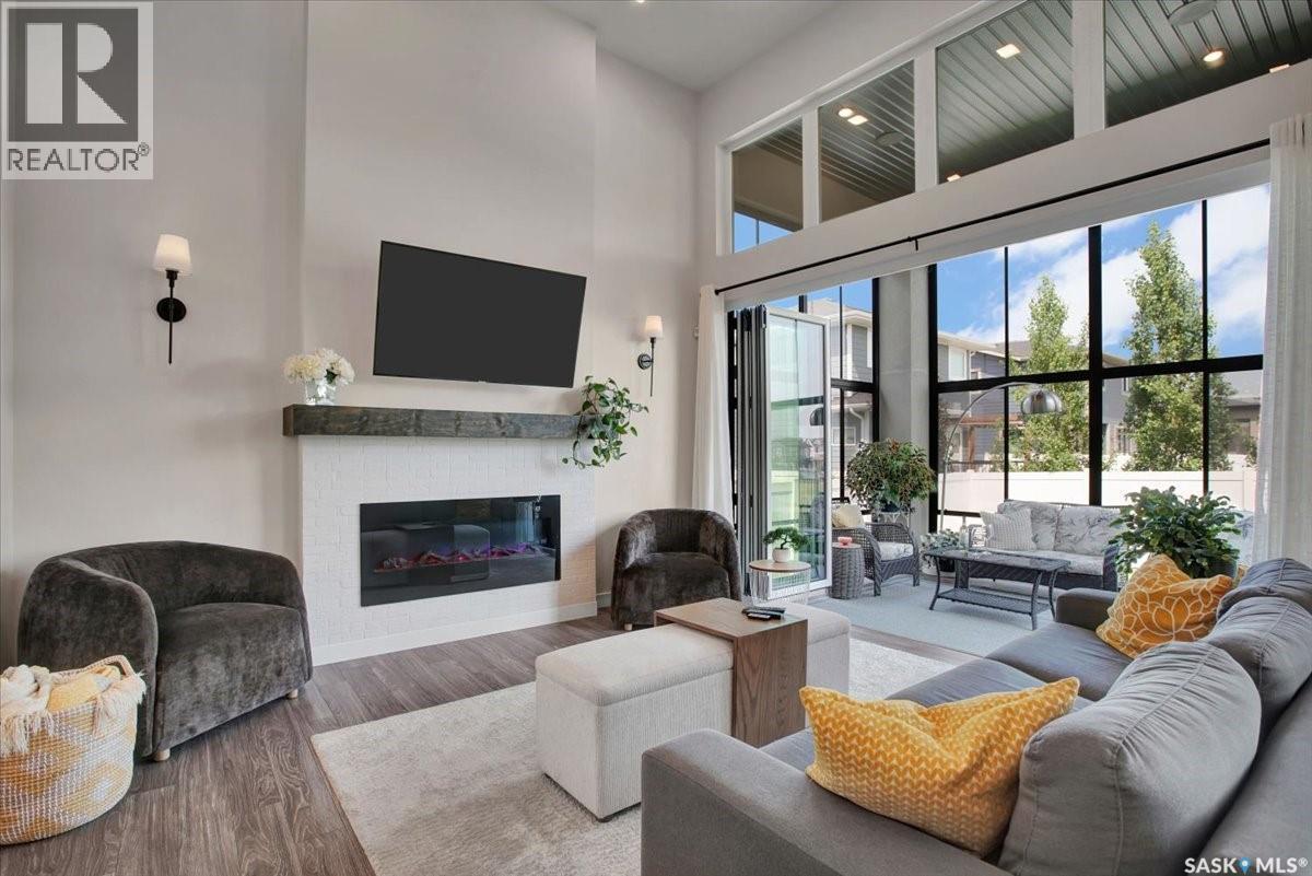 411 Dagnone Terrace, Saskatoon, SK - Indoor Photo Showing Living Room With Fireplace