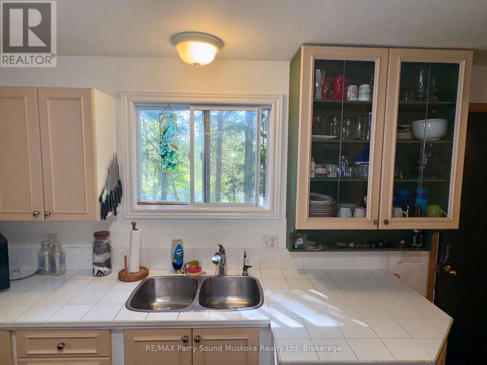 3 Robinson Road, Magnetawan (Ahmic Harbour), ON - Indoor Photo Showing Kitchen With Double Sink
