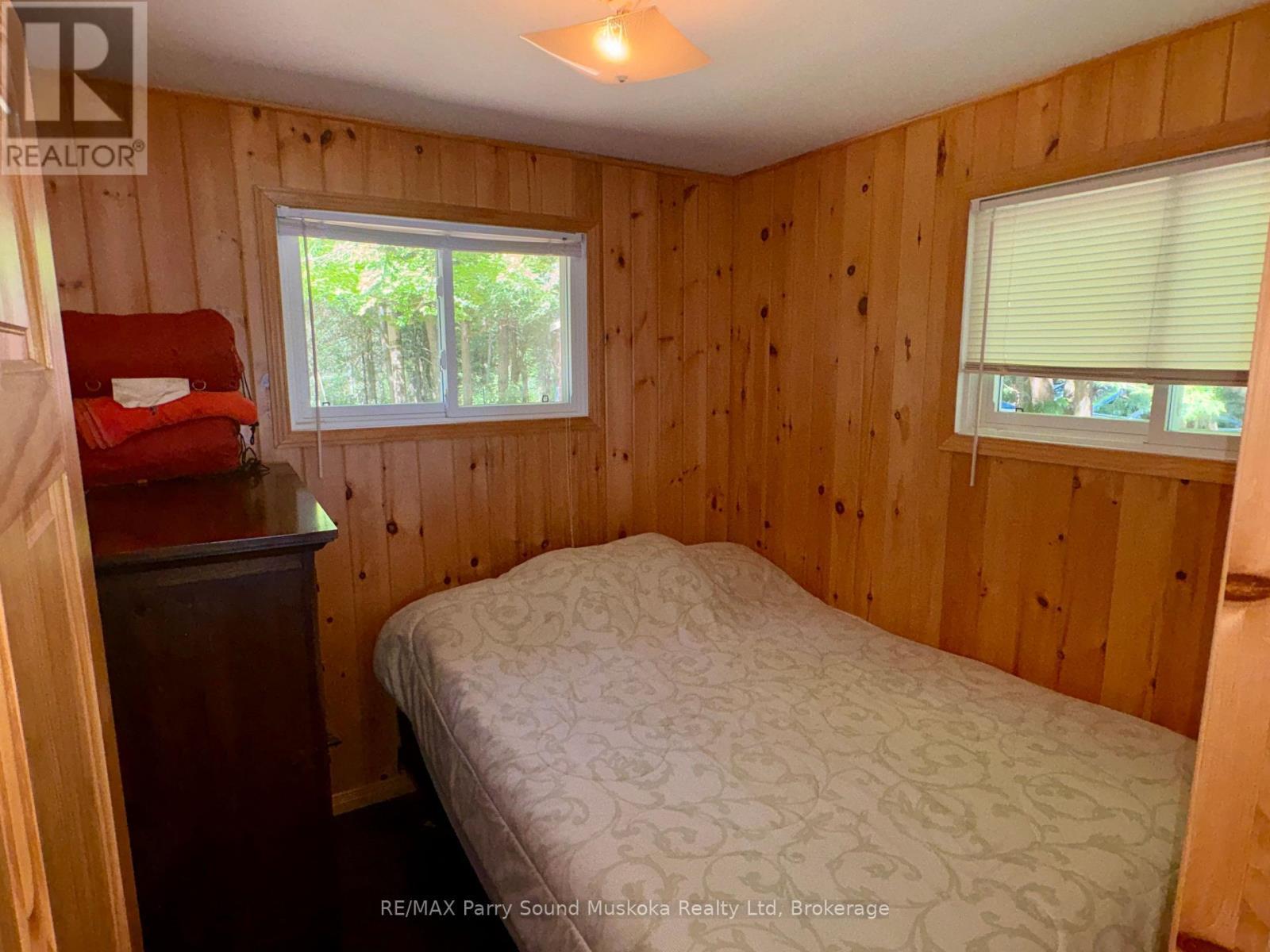 3 Robinson Road, Magnetawan (Ahmic Harbour), ON - Indoor Photo Showing Bedroom