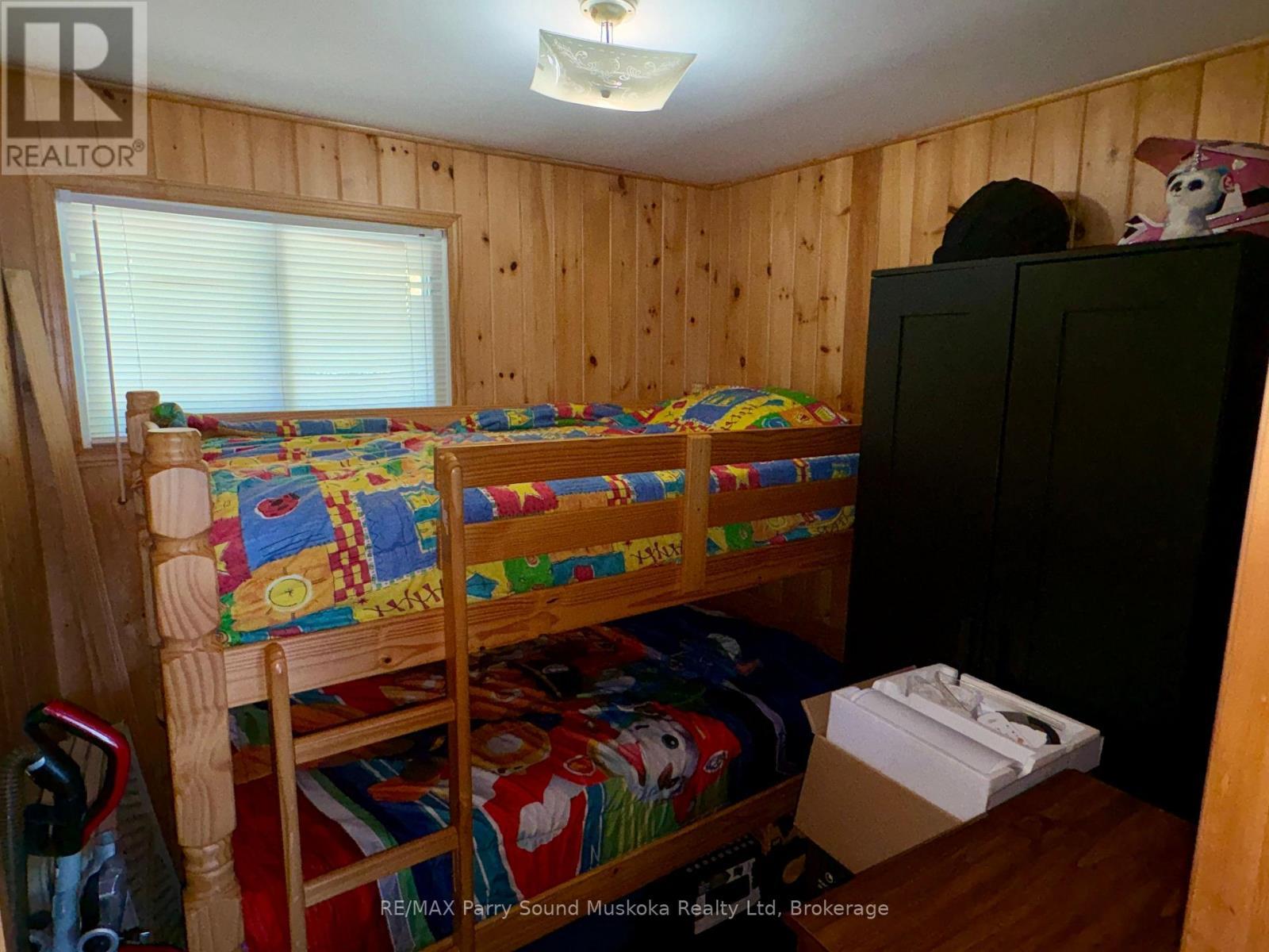 3 Robinson Road, Magnetawan (Ahmic Harbour), ON - Indoor Photo Showing Bedroom