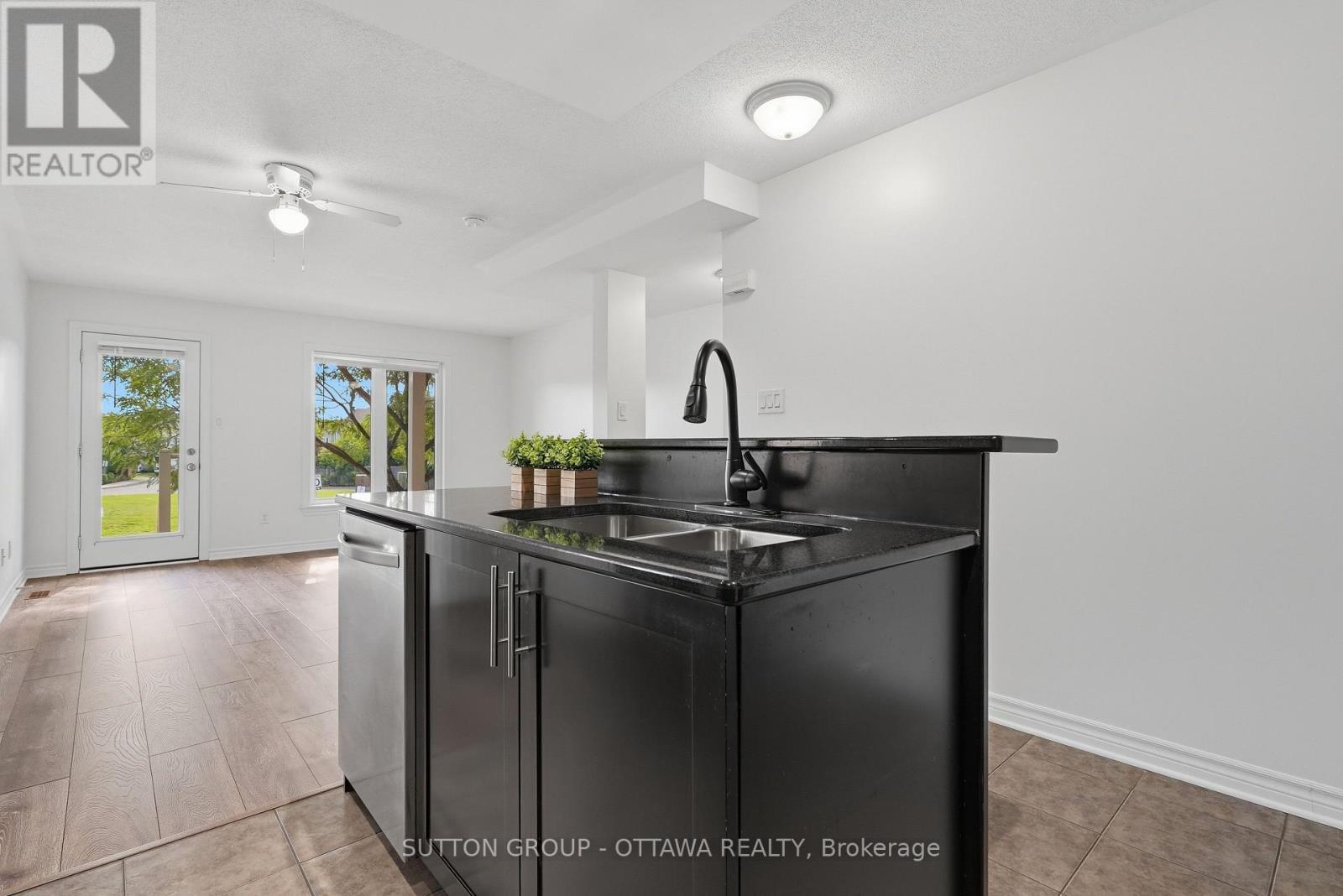 Kitchen / Family Room - 2563 Longfields Drive, Ottawa, ON - Indoor Photo Showing Kitchen With Double Sink
