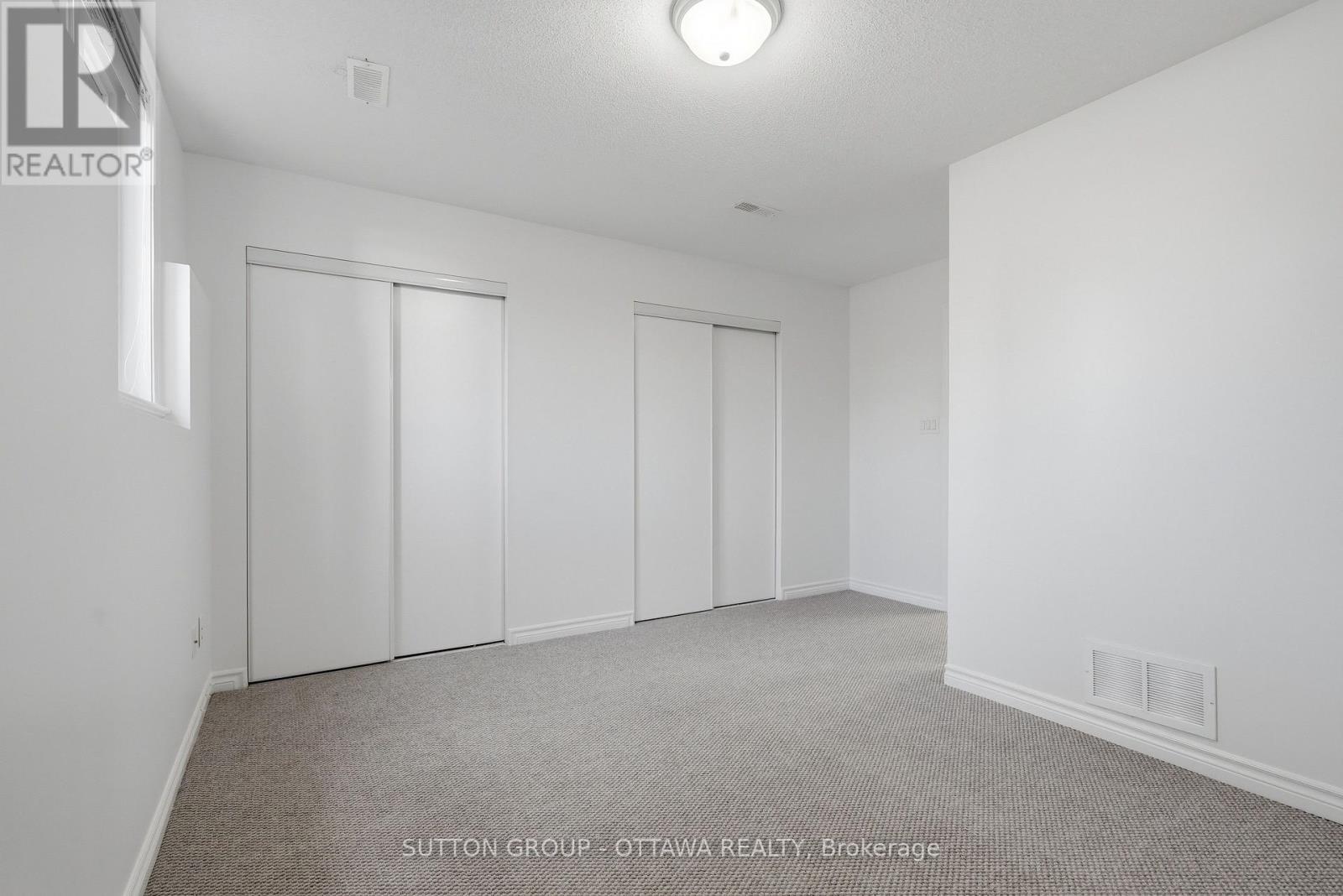 Primary Bedroom - Large Closets - 2563 Longfields Drive, Ottawa, ON - Indoor Photo Showing Other Room