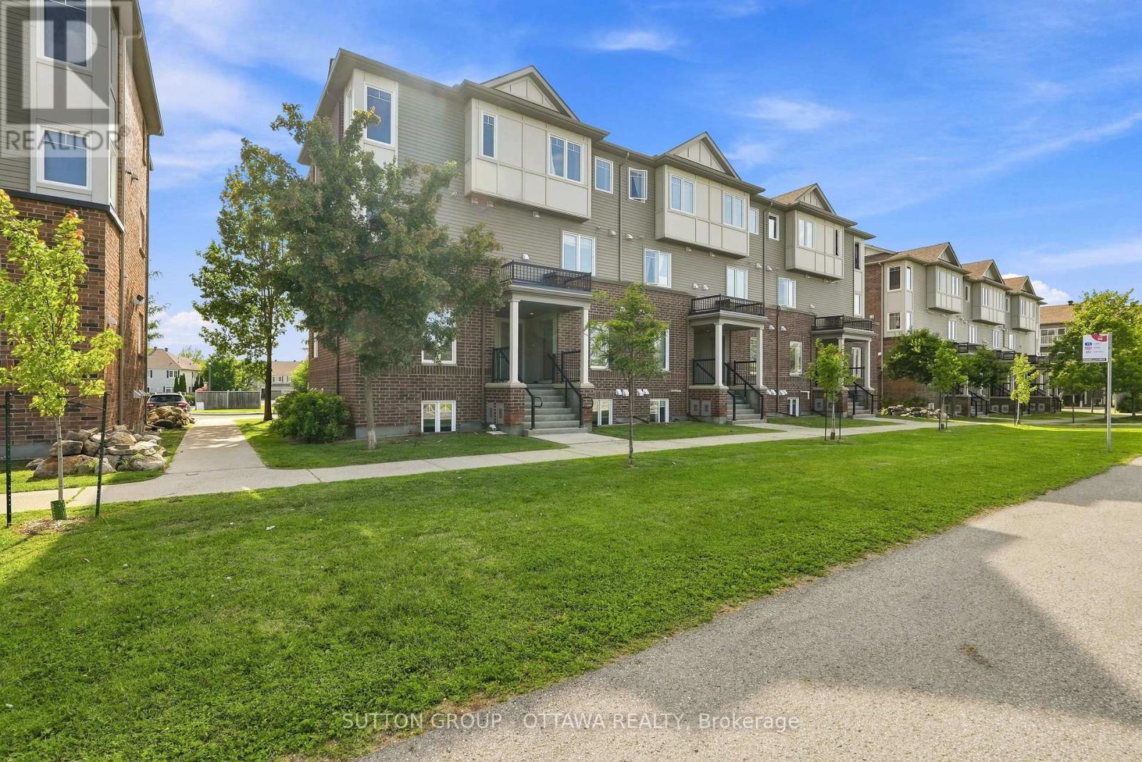 Front View of Condos - 2563 Longfields Drive, Ottawa, ON - Outdoor With Facade