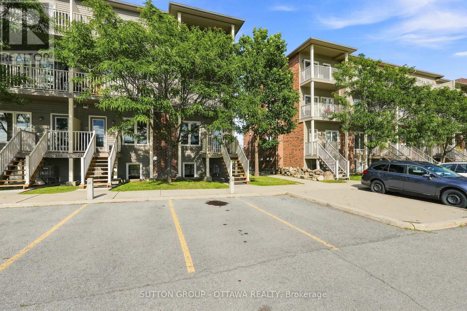 Parking Spot #75 - 2563 Longfields Drive, Ottawa, ON - Outdoor With Facade