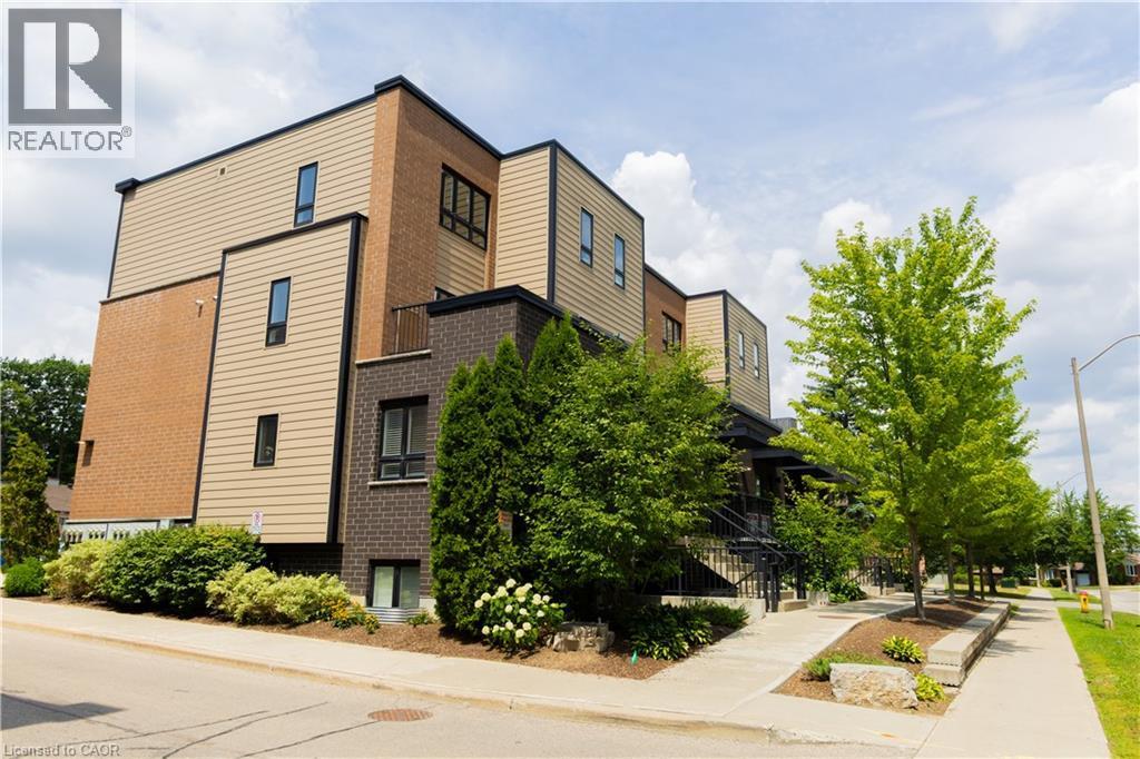 Contemporary multi-story exterior with a varied facade of brick and horizontal siding - 190 Century Hill Drive Unit# A5, Kitchener, ON - Outdoor