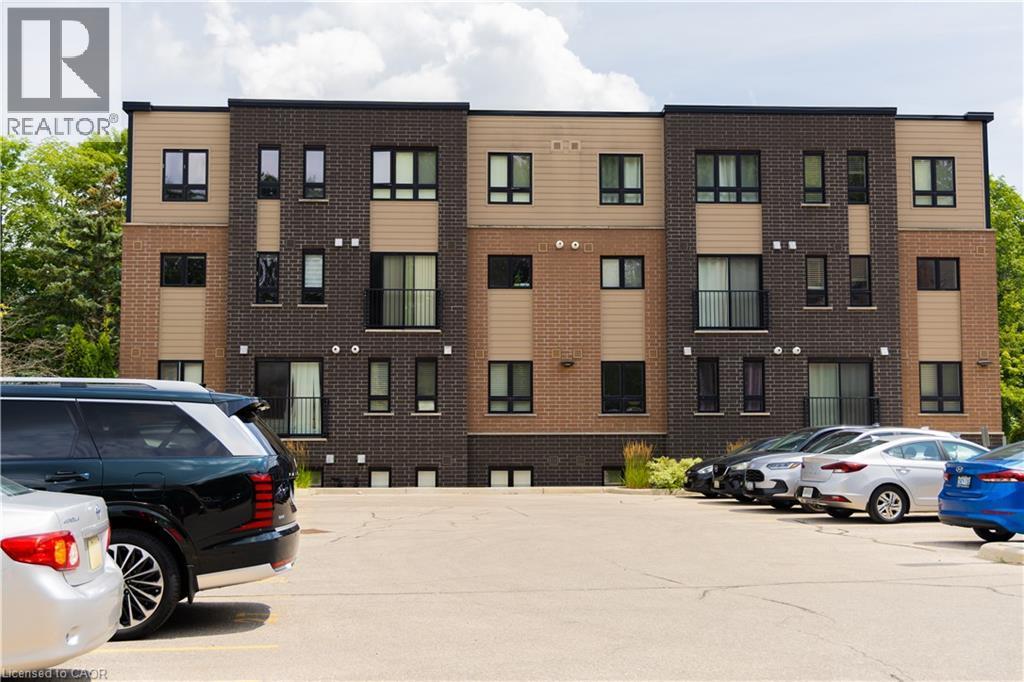 Contemporary multi-story building featuring a brick and siding facade - 190 Century Hill Drive Unit# A5, Kitchener, ON - Outdoor