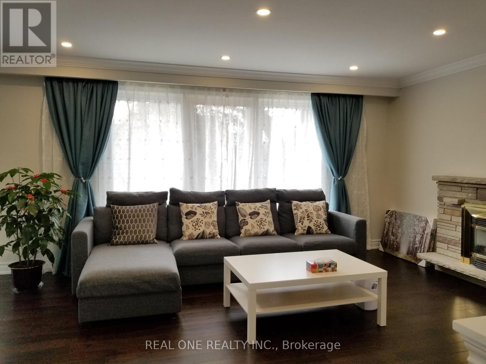 Living Room 1 - 26 Applefield Drive, Toronto, ON - Indoor Photo Showing Living Room With Fireplace