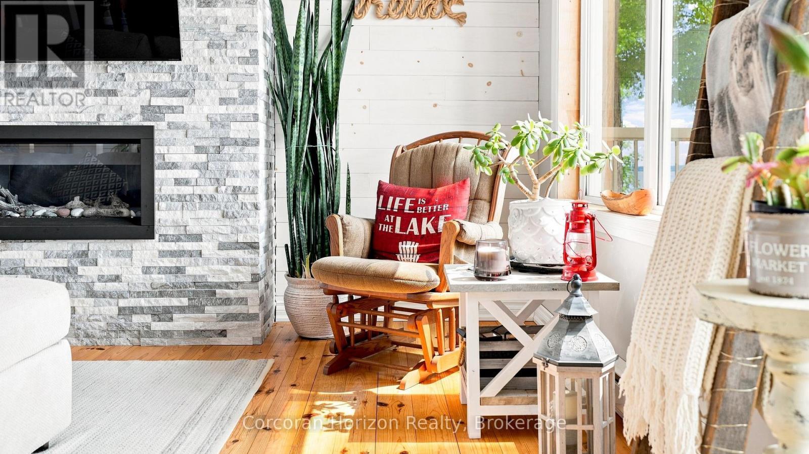 380 Robins Point Road, Tay (Victoria Harbour), ON - Indoor Photo Showing Other Room With Fireplace