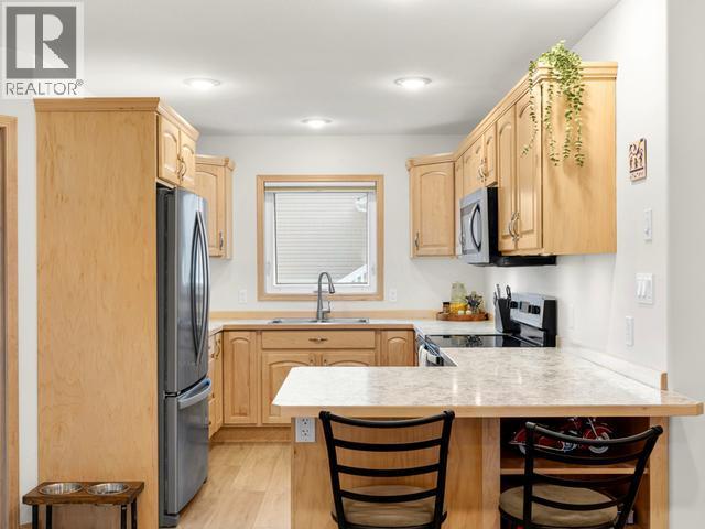 105-250 Olive May Way, Whitehorse, YT - Indoor Photo Showing Kitchen