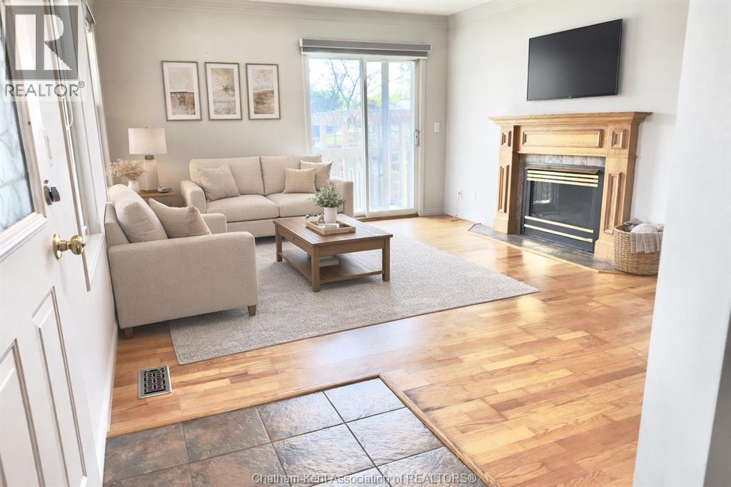 6121 Emerson Avenue, Comber, ON - Indoor Photo Showing Living Room With Fireplace