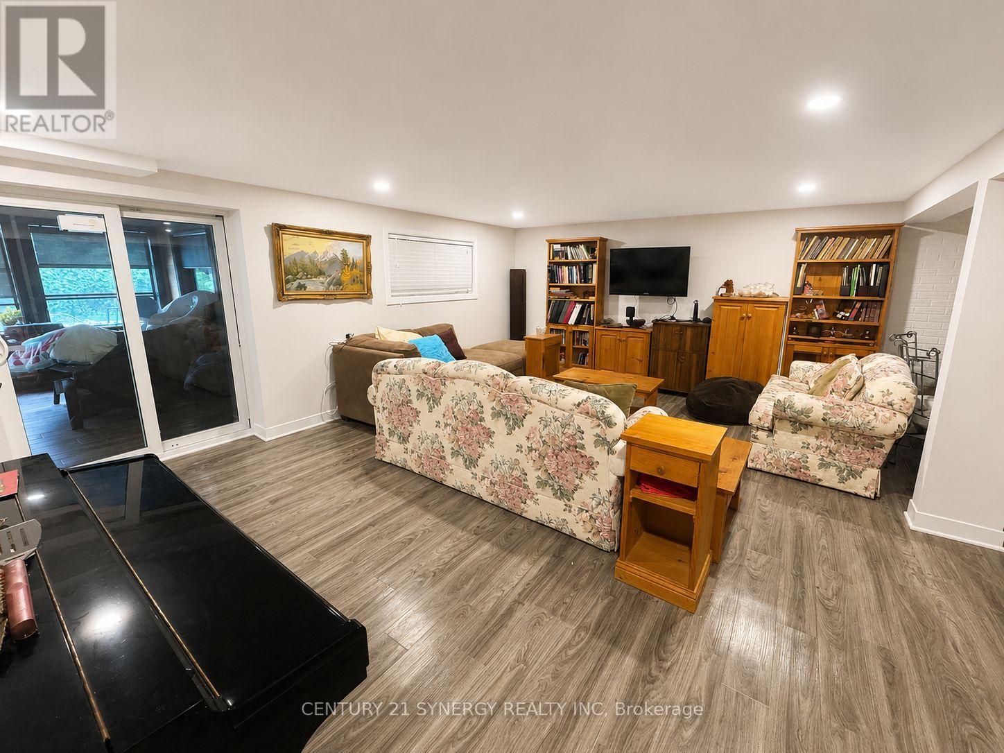 Family Room Lower Level - Colour Enhanced - 26 Turtleback Way, Ottawa, ON - Indoor Photo Showing Living Room