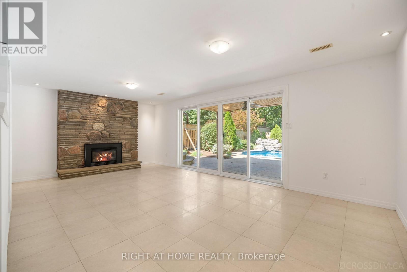 39 Grovetree Road, Toronto, ON - Indoor With Fireplace