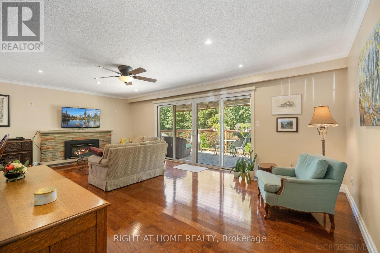 39 Grovetree Road, Toronto, ON - Indoor Photo Showing Living Room With Fireplace
