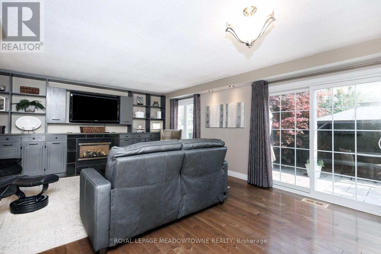 38 Mckillop Court, Brampton, ON - Indoor Photo Showing Living Room With Fireplace